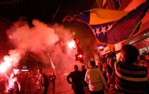 Bosnia fans celebrate their 2014 World Cup qualifying match victory with flares in Sarajevo