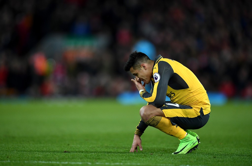 LIVERPOOL, ENGLAND - MARCH 04: Alexis Sanchez of Arsenal looks dejected during the Premier League match between Liverpool and Arsenal at Anfield on March 4, 2017 in Liverpool, England. (Photo by Laurence Griffiths/Getty Images)