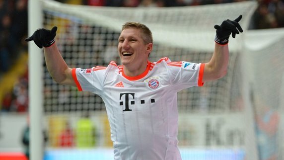 Bayern Munich take Bundesliga title with a 1-0 win at Frankfurt, thanks to Schweinsteiger's goal.