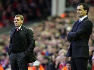 Brendan Rodgers (left, Liverpool FC manager) and Roberto Martinez (right, Everton FC manager) |