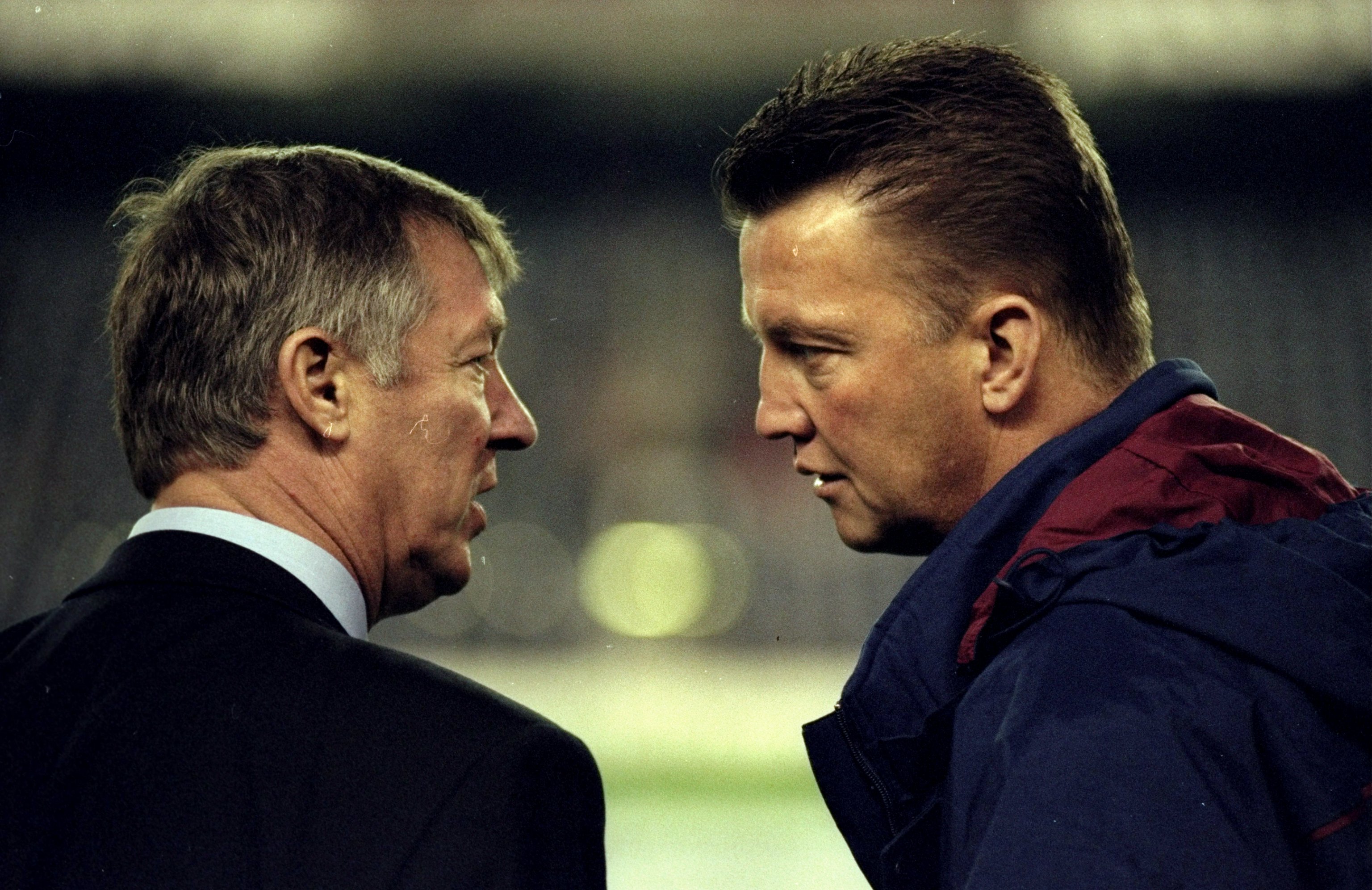 25 Nov 1998:  Manchester United manager Alex Ferguson comes face to face with Barcelona coach Louis van Gaal in the UEFA Champions League match at the Nou Camp in Barcelona, Spain. The game ended 3-3.  Mandatory Credit: Shaun Botterill /Allsport