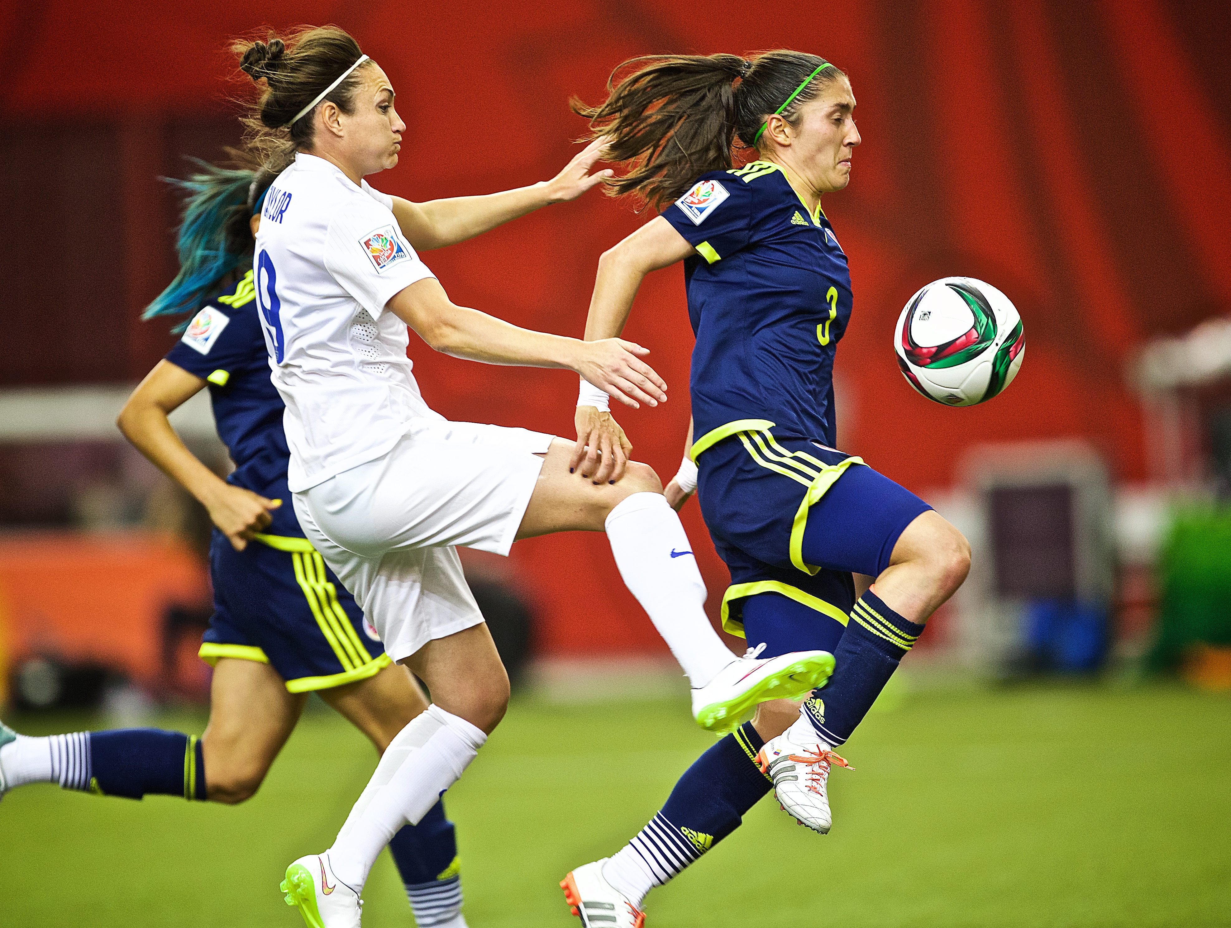 Colombia's Nahtalia Gaitan Defender (R)in action against  England's Eniola Aluko forward (L) during second half in the FIFA Women's World Cup Group F match between England and Colombia in the Olympic Stadium in Montreal, Canada,