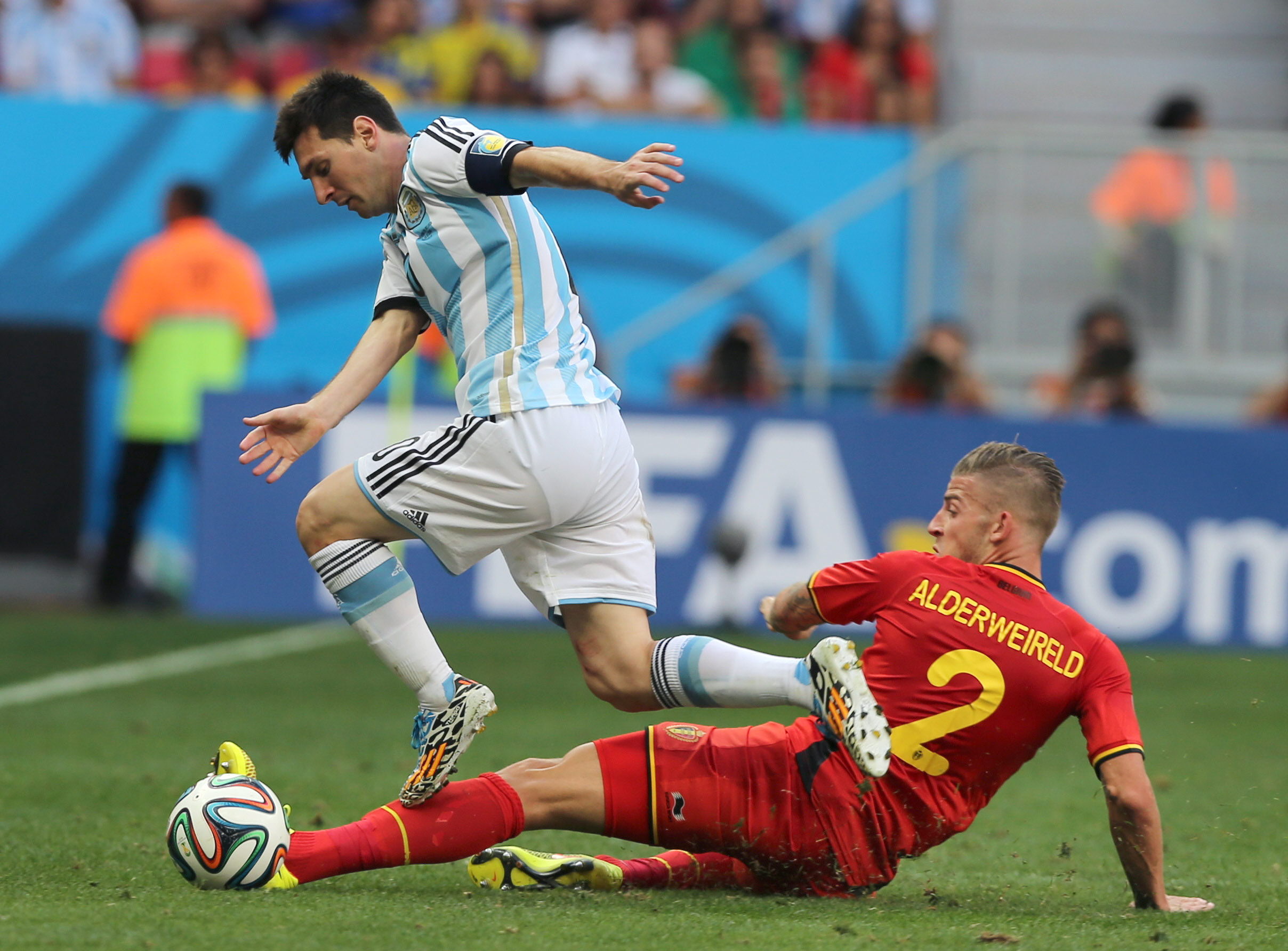 epa04301130 Lionel Messi (L) of Argentina vies with Toby Alderweireld of Belgium during the FIFA World Cup 2014 quarter final match between Argentina and Belgium at the Estadio Nacional in Brasilia, Brazil, 05 July 2014. 

(RESTRICTIONS APPLY: Editorial Use Only, not used in association with any commercial entity - Images must not be used in any form of alert service or push service of any kind including via mobile alert services, downloads to mobile devices or MMS messaging - Images must appear as still images and must not emulate match action video footage - No alteration is made to, and no text or image is superimposed over, any published image which: (a) intentionally obscures or removes a sponsor identification image; or (b) adds or overlays the commercial identification of any third party which is not officially associated with the FIFA World Cup)  EPA/BALLESTEROS   EDITORIAL USE ONLY