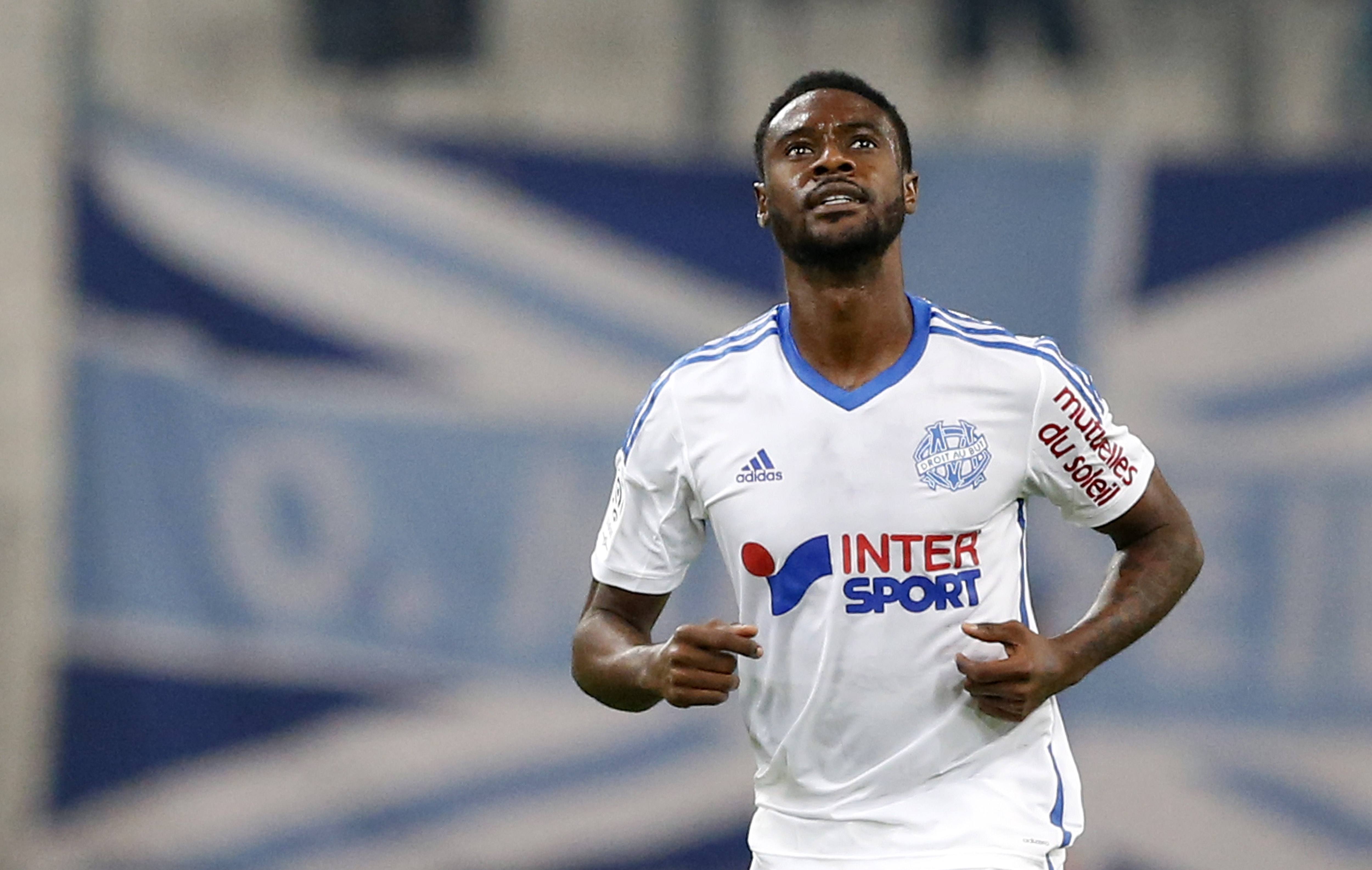 epa04473782 Nicolas Julio Nkoulou Ndoubena of Olympique Marseille celebrates after scoring a goal against RC Lens during their French Ligue 1 soccer match at the Velodrome stadium, Marseille, southern France, 2 November 2014.  EPA/GUILLAUME HORCAJUELO