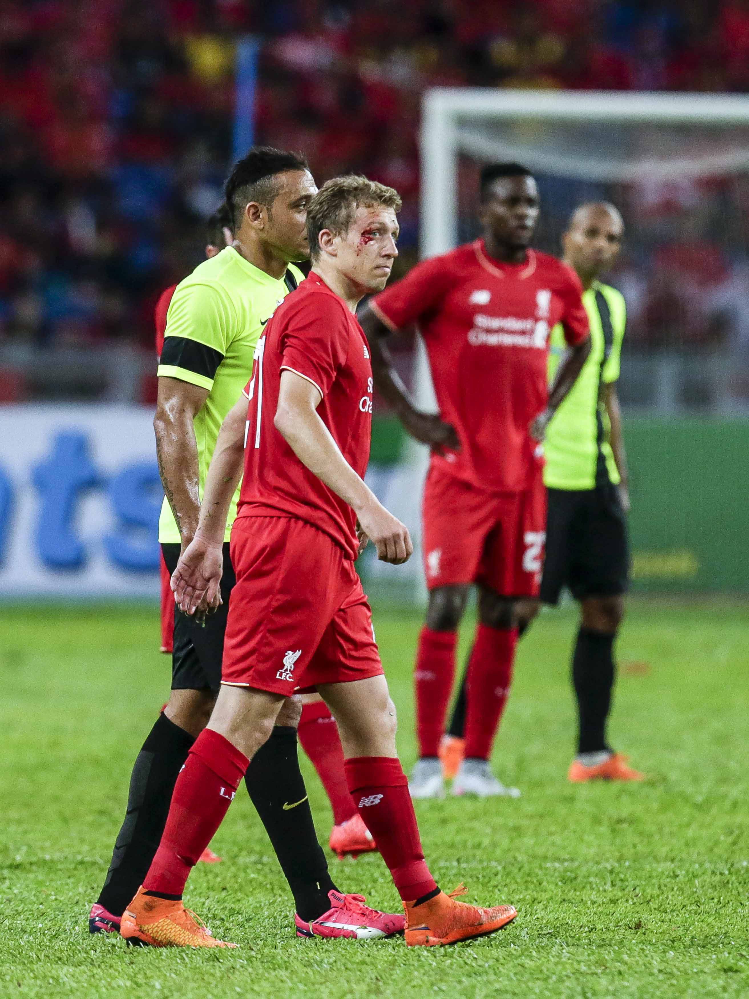 Lucas loves Liverpool and has bled for the Reds' often on the pitch but the Brazilian understands he must move on if he wants to play regular first-team football. (Picture Courtesy - AFP/Getty Images)