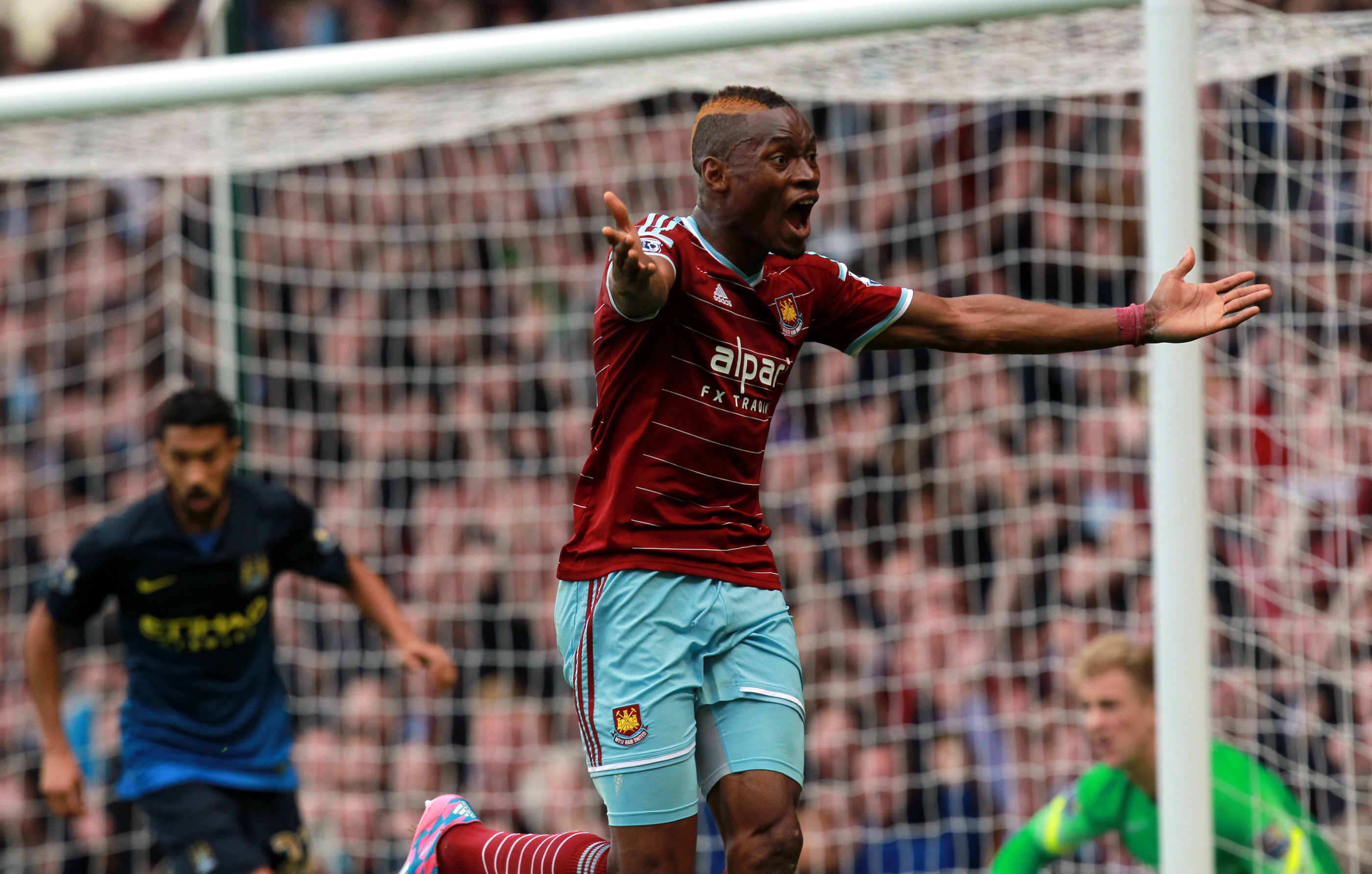 epa04463058 West Ham's Diafra Sakho celebrates scoring the 2-0 goal during the English Premier League soccer match between West Ham United and Manchester City at Upton Park, London, Britain, 25 October 2014.  EPA/SEAN DEMPSEY DataCo terms and conditions apply. http://www.epa.eu/files/Terms%20and%20Conditions/DataCo_Terms_and_Conditions.pdf