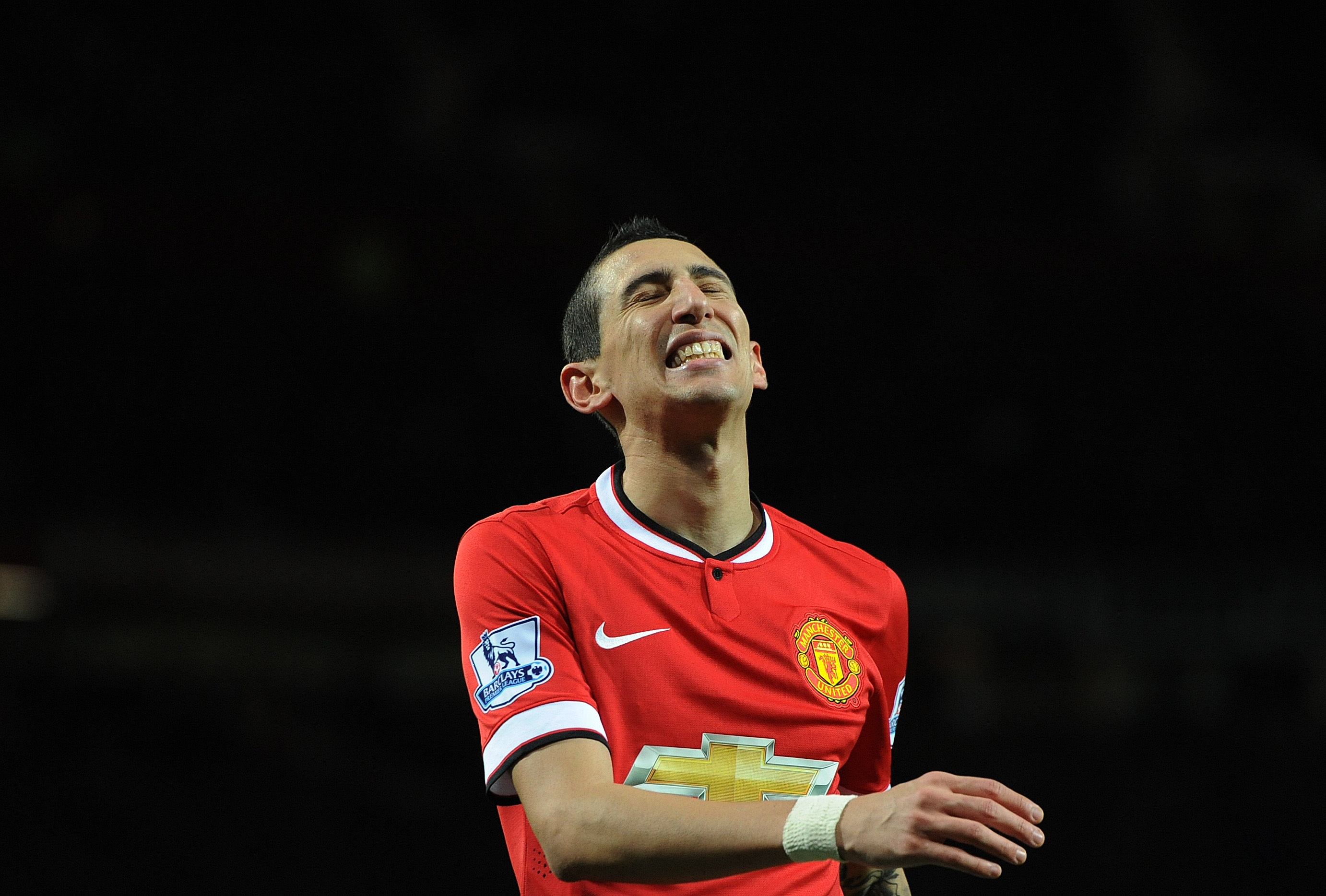 epa04555587 Manchester United's Angel Di Maria reacts during the English Premier League soccer match between Manchester United and Southampton at the Old Trafford in Manchester, Britain, 11 January 2015.  EPA/PETER POWELL DataCo terms and conditions apply 
http://www.epa.eu/files/Terms%20and%20Conditions/DataCo_Terms_and_Conditions.pdf