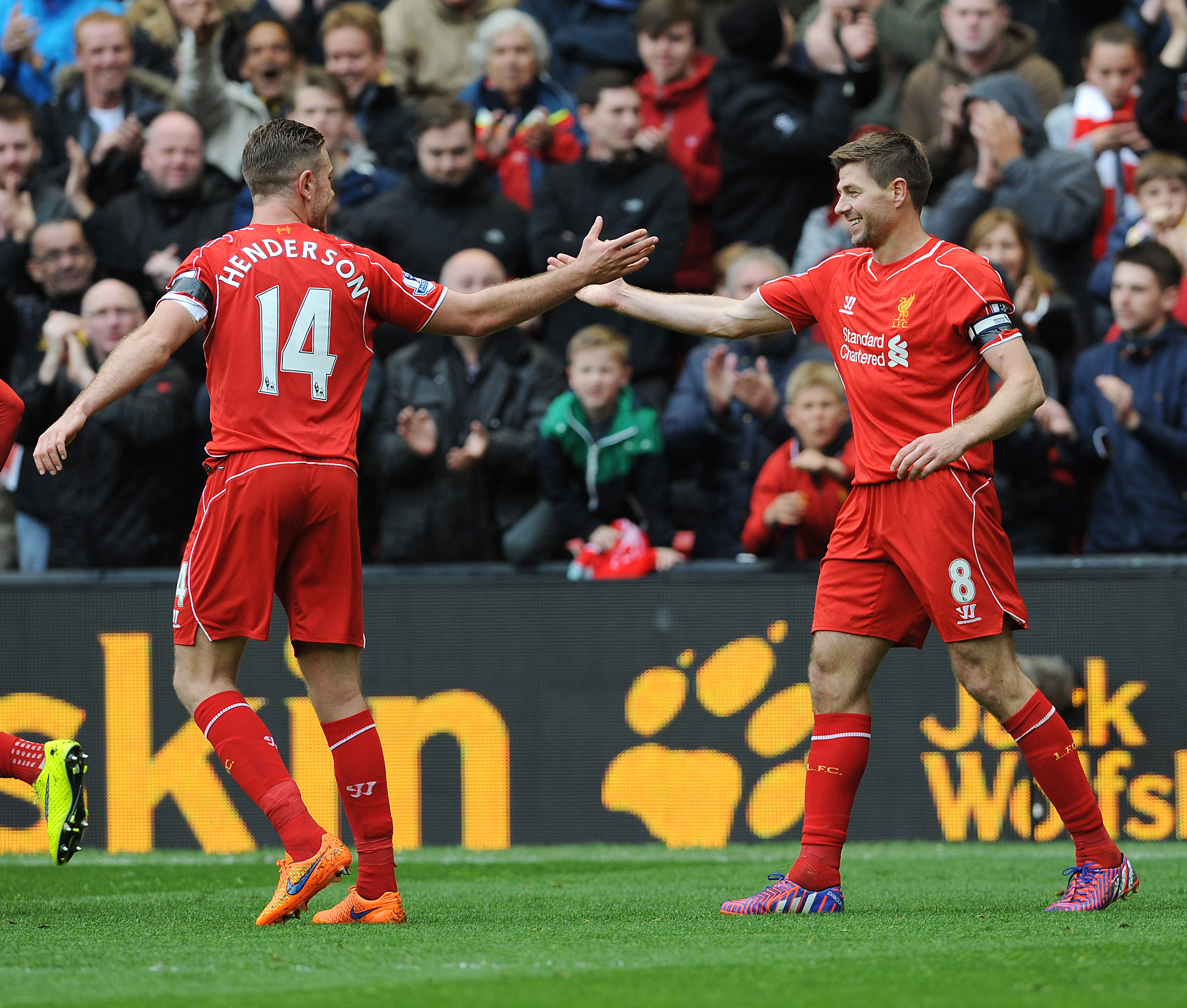 epa04730269 Liverpool's Jordan Henderson (L) congratulates Steven Gerrard (R) reacts after scoring the winning goal during the English Premier League soccer match between Liverpool and Queens Park Rangers at the Anfield in Liverpool, Britain, 02 May 2015.  EPA/PETER POWELL DataCo terms and conditions apply 
http://www.epa.eu/files/Terms%20and%20Conditions/DataCo_Terms_and_Conditions.pdf