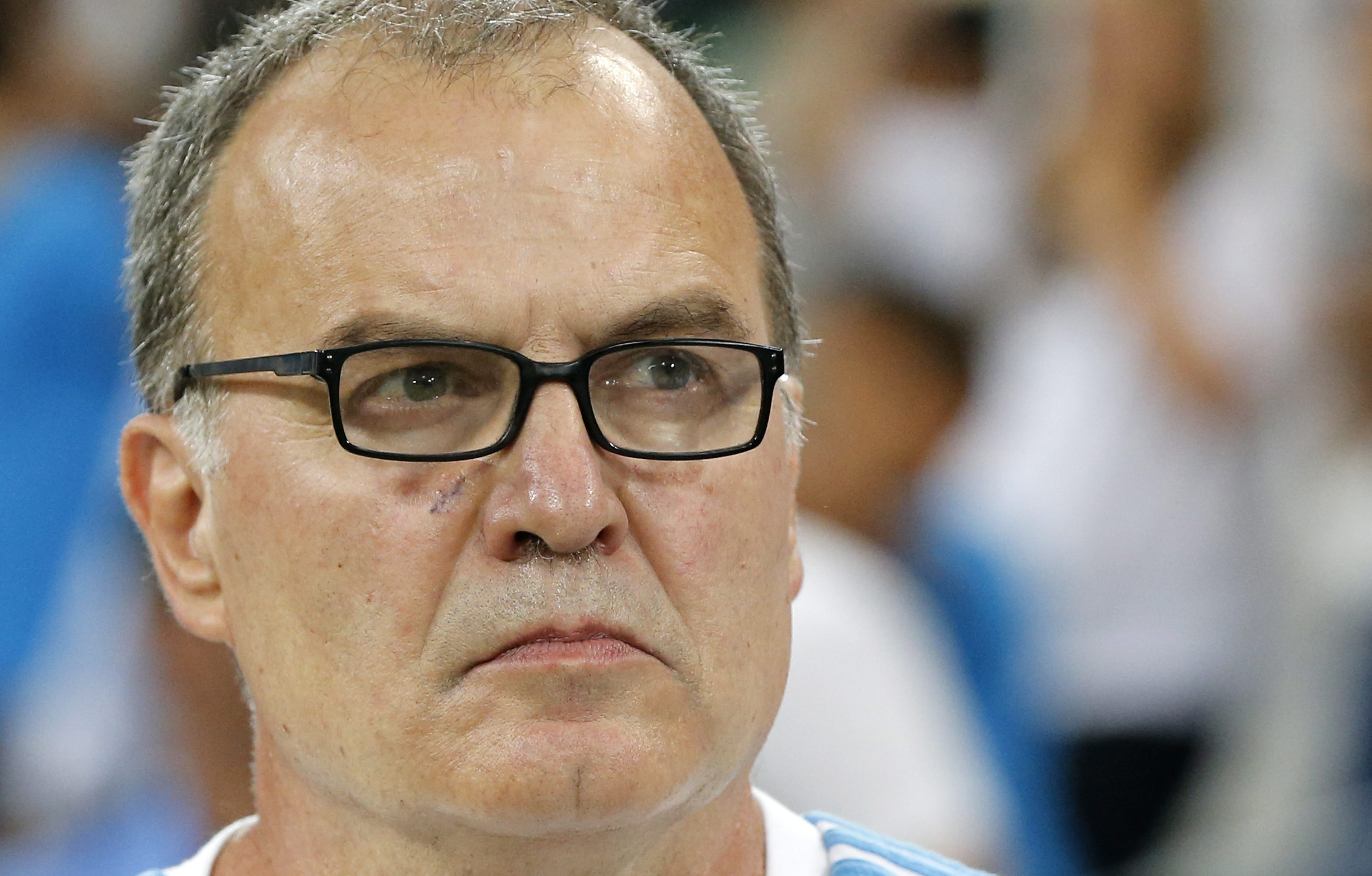 epa04877787 Olympique Marseille Argentinean head coach Marcelo Bielsa reacts before the soccer league 1 match between Olympique Marseille and SM Caen, at Velodrome stadium, Marseille, Southern France, 8 August 2015. Bielsa announced his resignation from the soccer club, in a surprise move, minutes after Olympique Marseille's 0-1 loss to SM Caen.  EPA/GUILLAUME HORCAJUELO