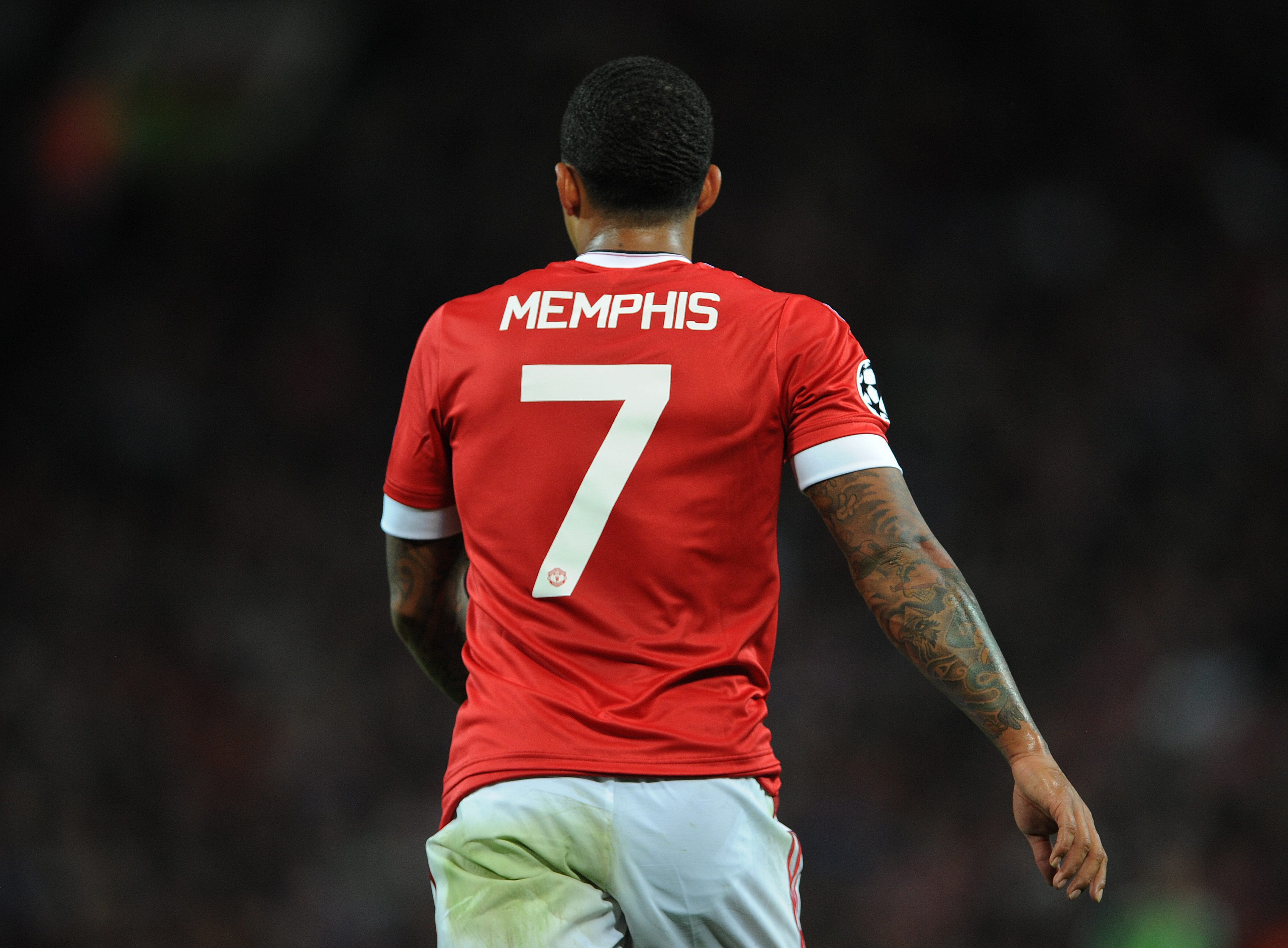 epa04888563 Manchester United's Memphis Depay in action during the UEFA Champions League play-off round first leg soccer match between Manchester United and Club Brugge held at the Old Trafford in Manchester, Britain, 18 August 2015.  EPA/PETER POWELL