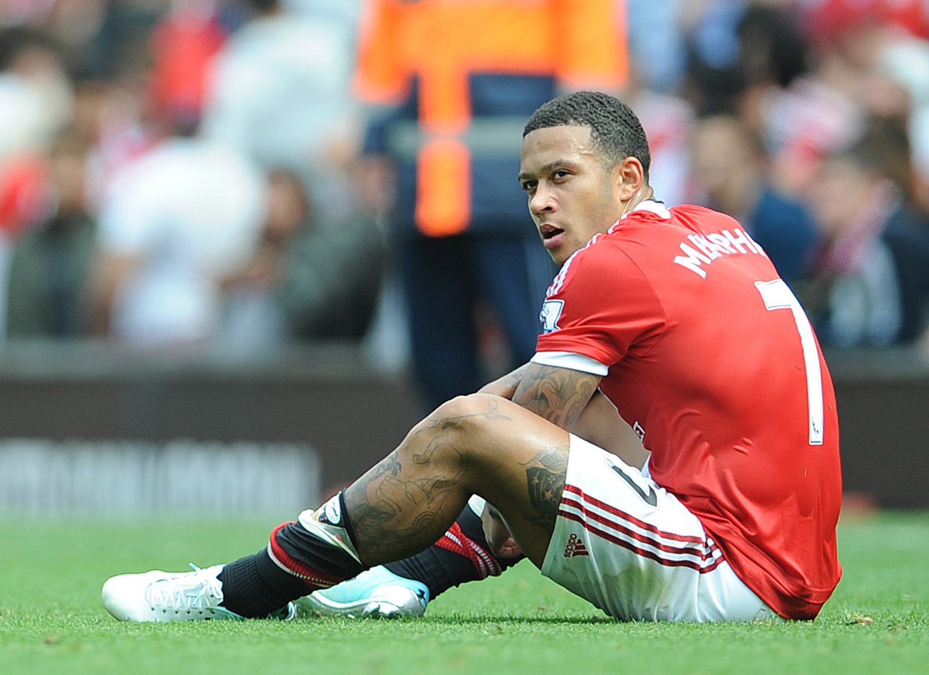 epa04892966 Manchester United's Memphis Depay reacts during the English Premier League soccer match between Manchester United and Newcastle United at Old Trafford, Manchester, Britain, 22 August 2015.  EPA/PETER POWELL EDITORIAL USE ONLY. No use with unauthorized audio, video, data, fixture lists, club/league logos or 'live' services. Online in-match use limited to 75 images, no video emulation. No use in betting, games or single club/league/player publications