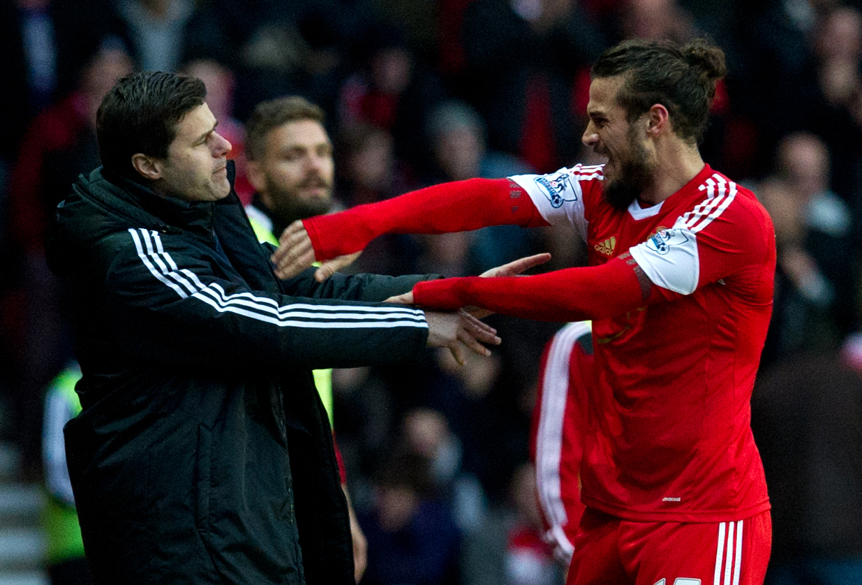 epa03981055 Southampton's Pablo Osvaldo (R) celebrates with manager Mauricio Pochettino during the English Premier League soccer match  Southampton vs Manchester City at the St. Mary's stadium, Southampton, Britain, 07 December 2013.  EPA/TOM HEVEZI https://www.epa.eu/downloads/DataCo-TCs.pdf