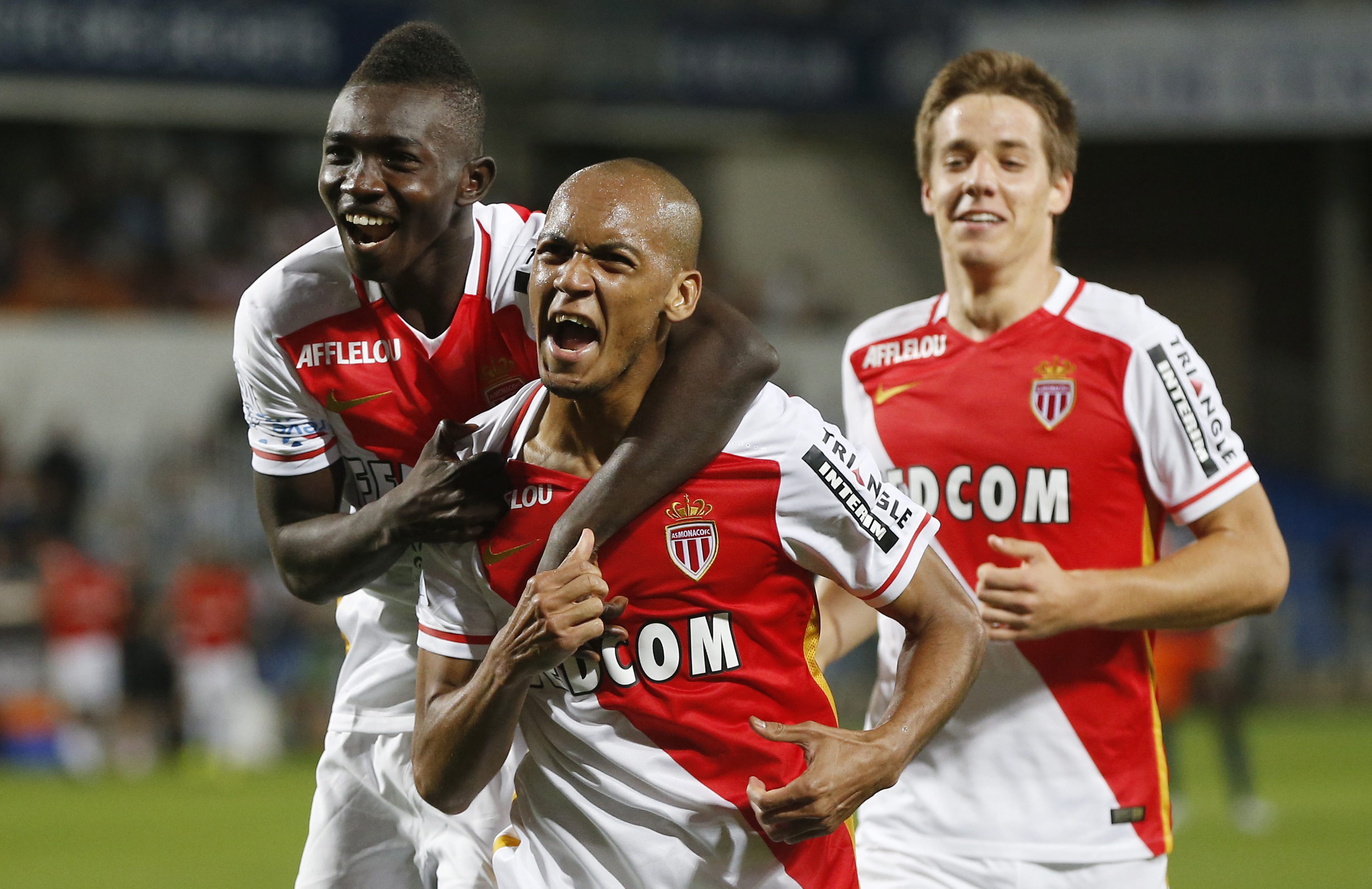 Fabinho (C) of ASM Monaco celebrates with his team mates after scoring a goal against Montpellier HSC during the French League 1 soccer match between ASM Monaco and Montpellier HSC, at La Mosson stadium, Montpellier, Southern France, 24 September 2015  (Photo Credit: EPA/GUILLAUME HORCAJUELO)