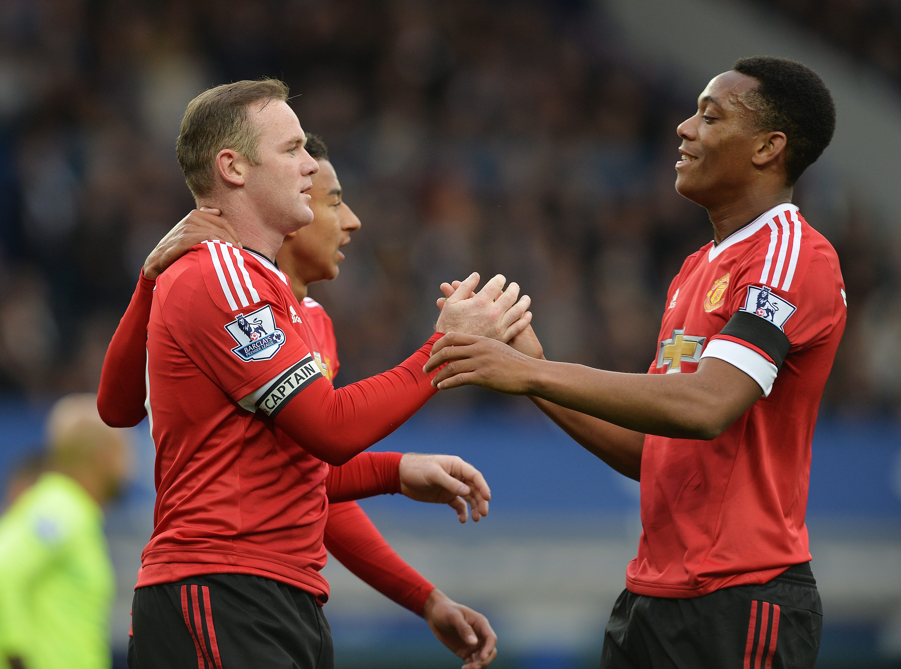 epa04981151 Manchester United's Wayne Rooney (L) is congratulated by Anthony Martial (R) after scoring the 3-0 lead during the English Premier League soccer match between Everton and Manchester United at Goodison Park, Liverpool, Britain, 17 October 2015.  EPA/PETER POWELL EDITORIAL USE ONLY. No use with unauthorized audio, video, data, fixture lists, club/league logos or 'live' services. Online in-match use limited to 75 images, no video emulation. No use in betting, games or single club/league/player publications