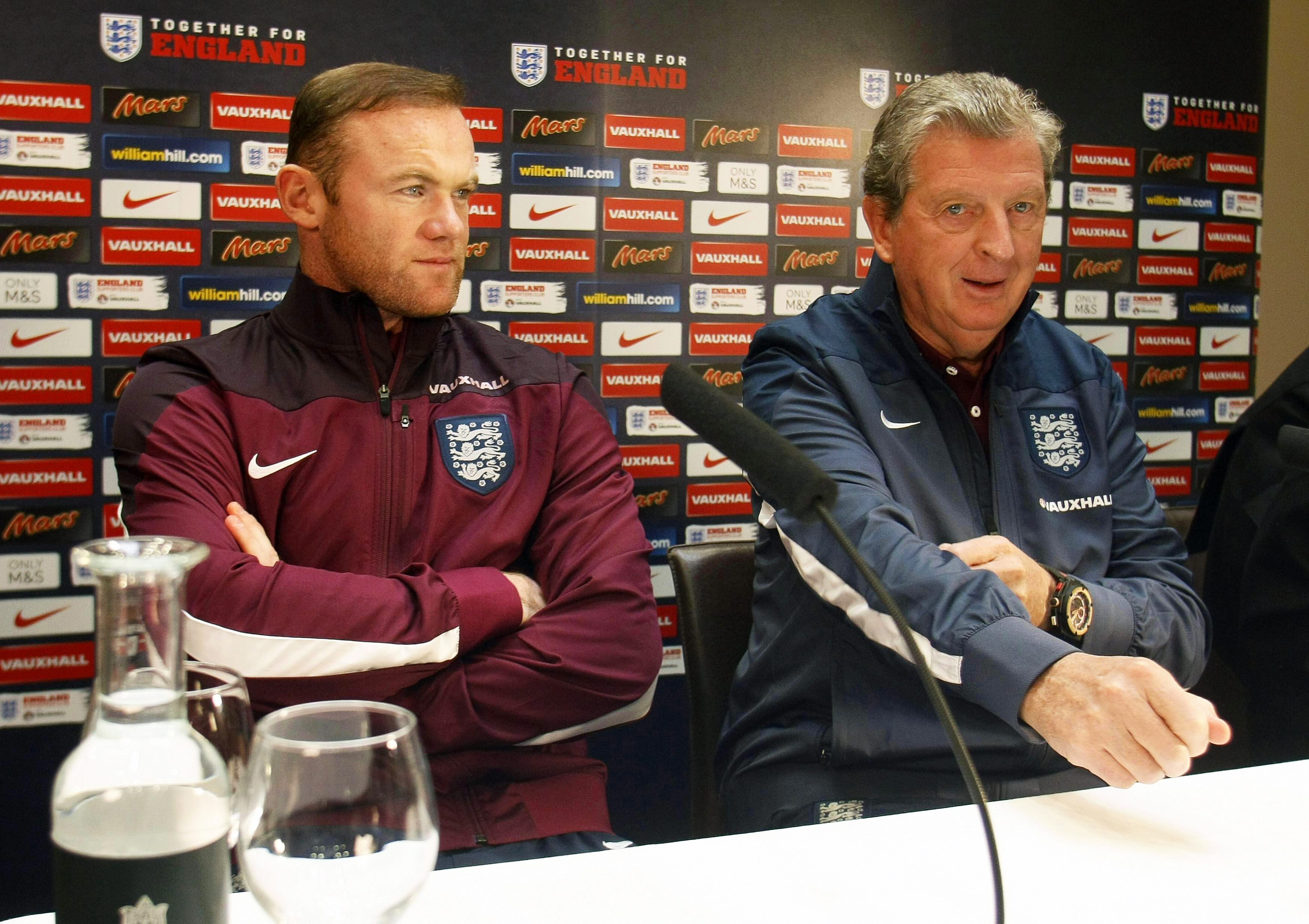 England manager Roy Hodgson (R) and Wayne Rooney (L) attend a press conference in Alicante, eastern Spain, 12 November 2015. (Photo by Morell/EPA)