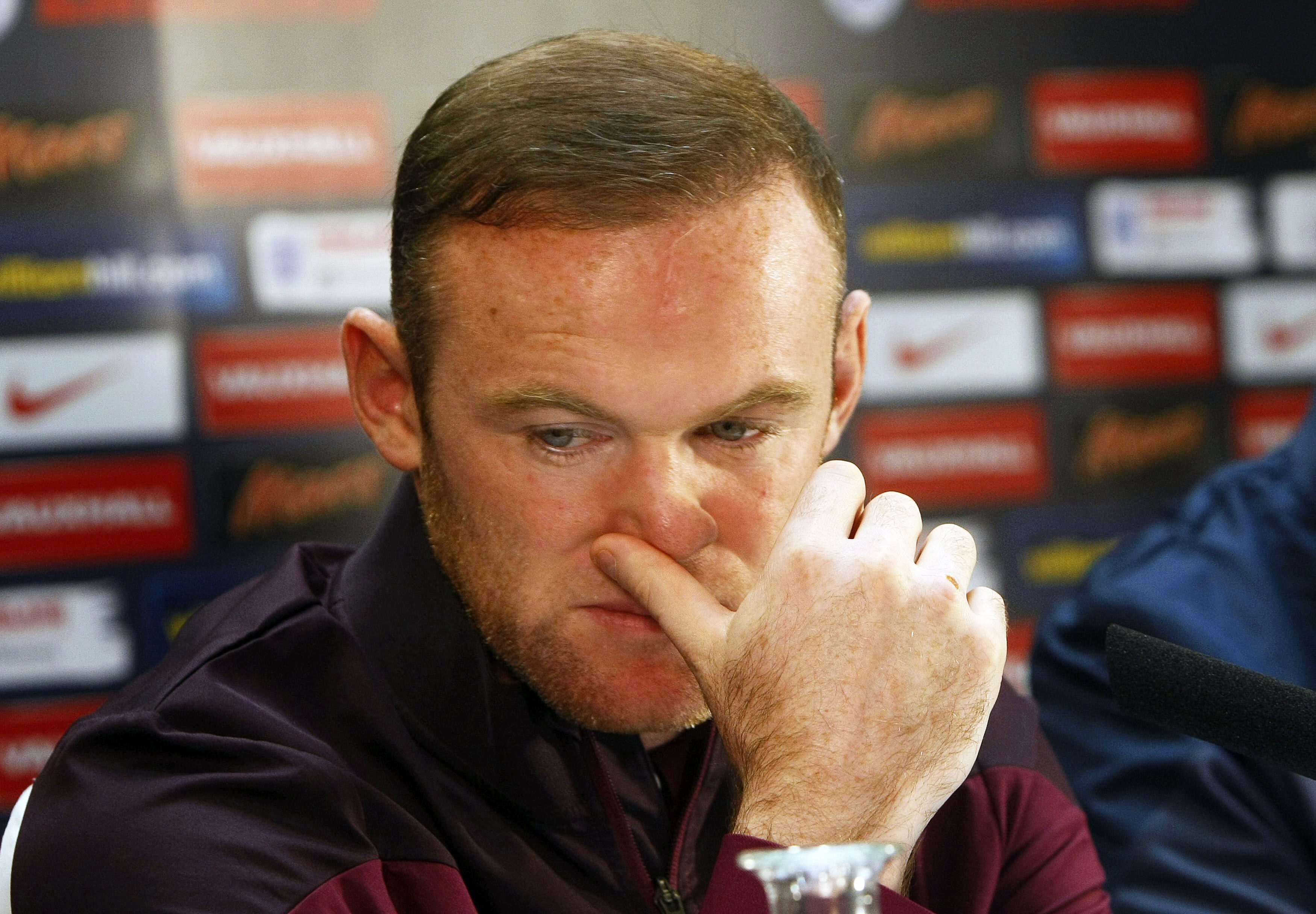 epa05022065 England player Wayne Rooney attends a press conference in Alicante, eastern Spain, 12 November 2015. England will face Spain in an international friendly soccer match on 13 November 2015.  EPA/MORELL