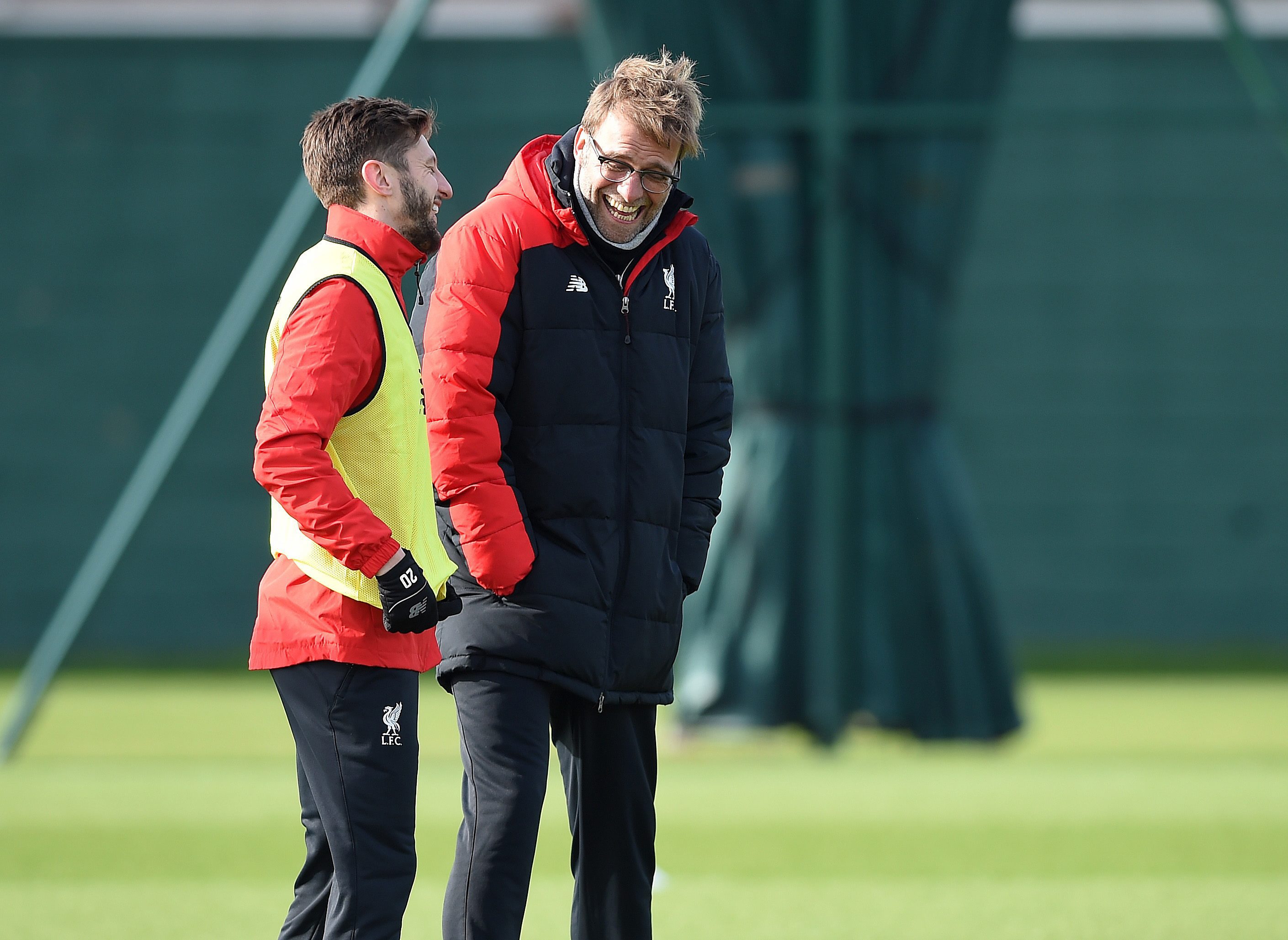 epa05181815 Liverpool's manager Jurgen Klopp (R) and his player Adam Lallana attend a training session at Melwood training facility in Liverpool, Britain, 26 February 2016. Liverpool face Manchester City in the Capital One Cup Final at Wembley stadium on 28 February 2016.  EPA/PETER POWELL