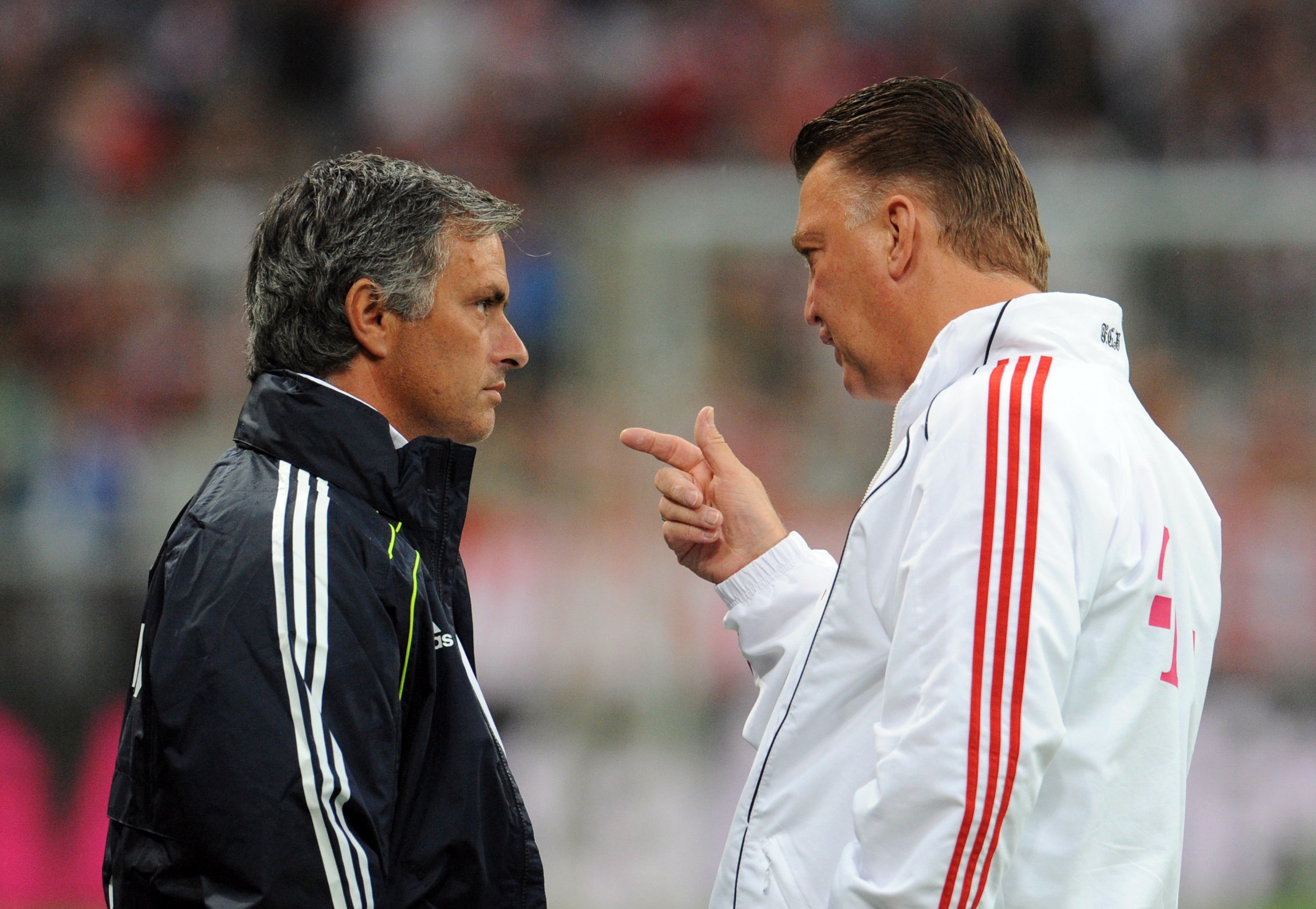 epa02285605 Bayern Munich head coach Louis van Gaal (R) chats with Real Madrid coach Jose Mourinho prior to the soccer friendly match between FC Bayern Munich and Real Madrid at the Allianz Arena stadium in Munich, Germany, 13 August 2010.  EPA/ANDREAS GEBERT