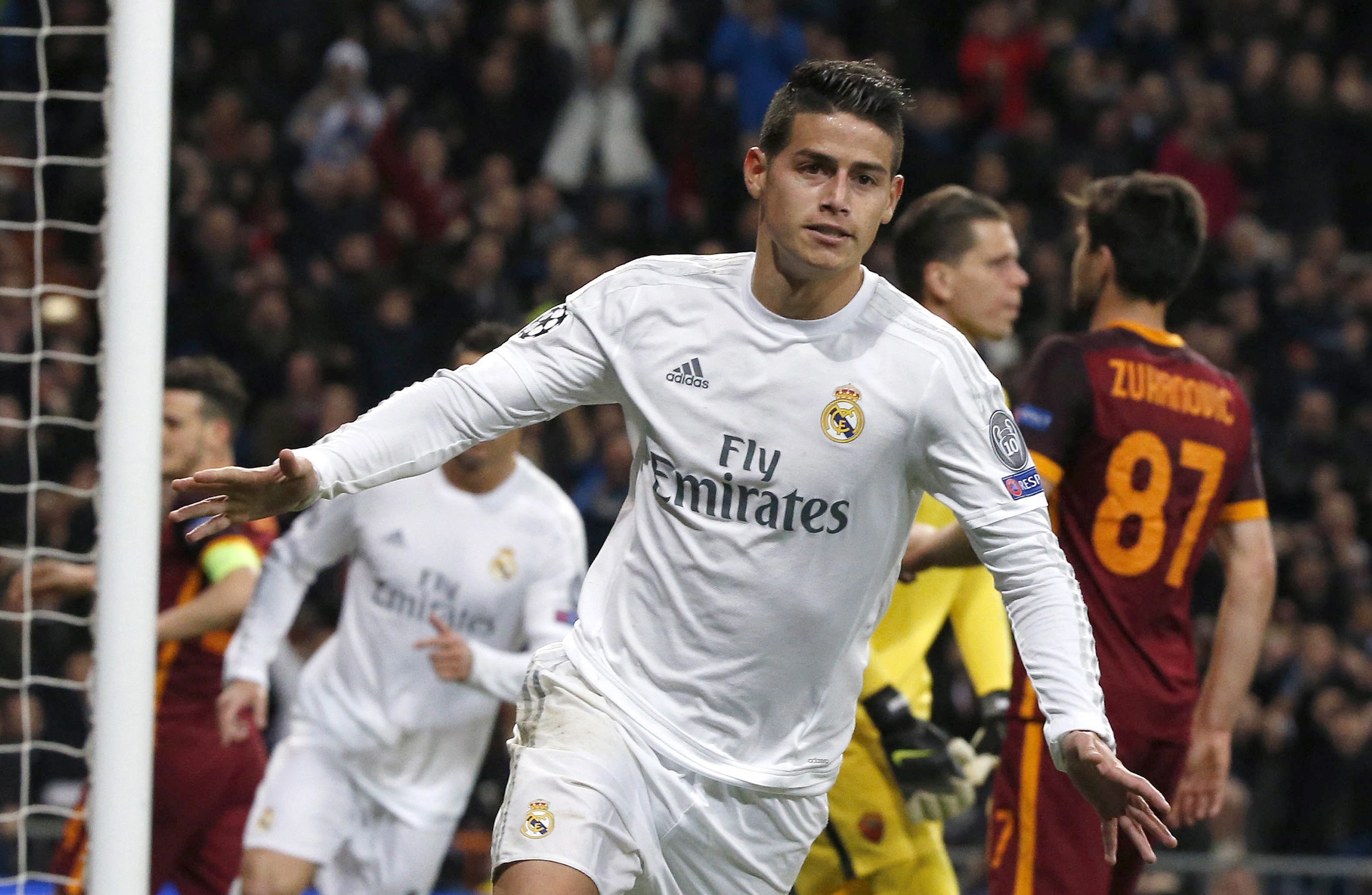 Real Madrid's Colombian midfielder James Rodriguez jublates his goal against AS Roma during their Champions League round of 16 second leg match played at Santiago Bernabeu stadium in Madrid, Spain, 08 March 2016.  (Photo by Kiko Huesca/EPA)