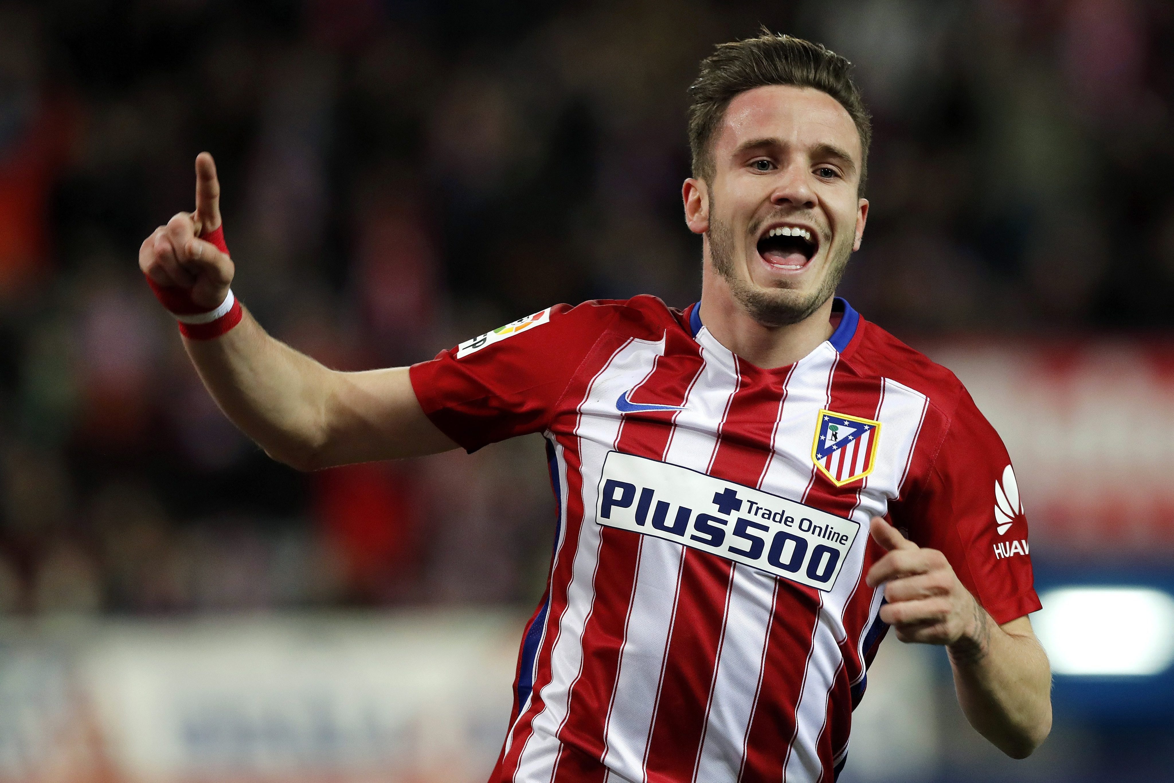 epa05208308 Atletico Madrid's Spanish midfielder Saul Niguez celebrates scoring against Deportivo during their Spanish Primera Division soccer match at Vicente Calderon stadium in Madrid, Spain, 12 March 2016.  EPA/Chema Moya