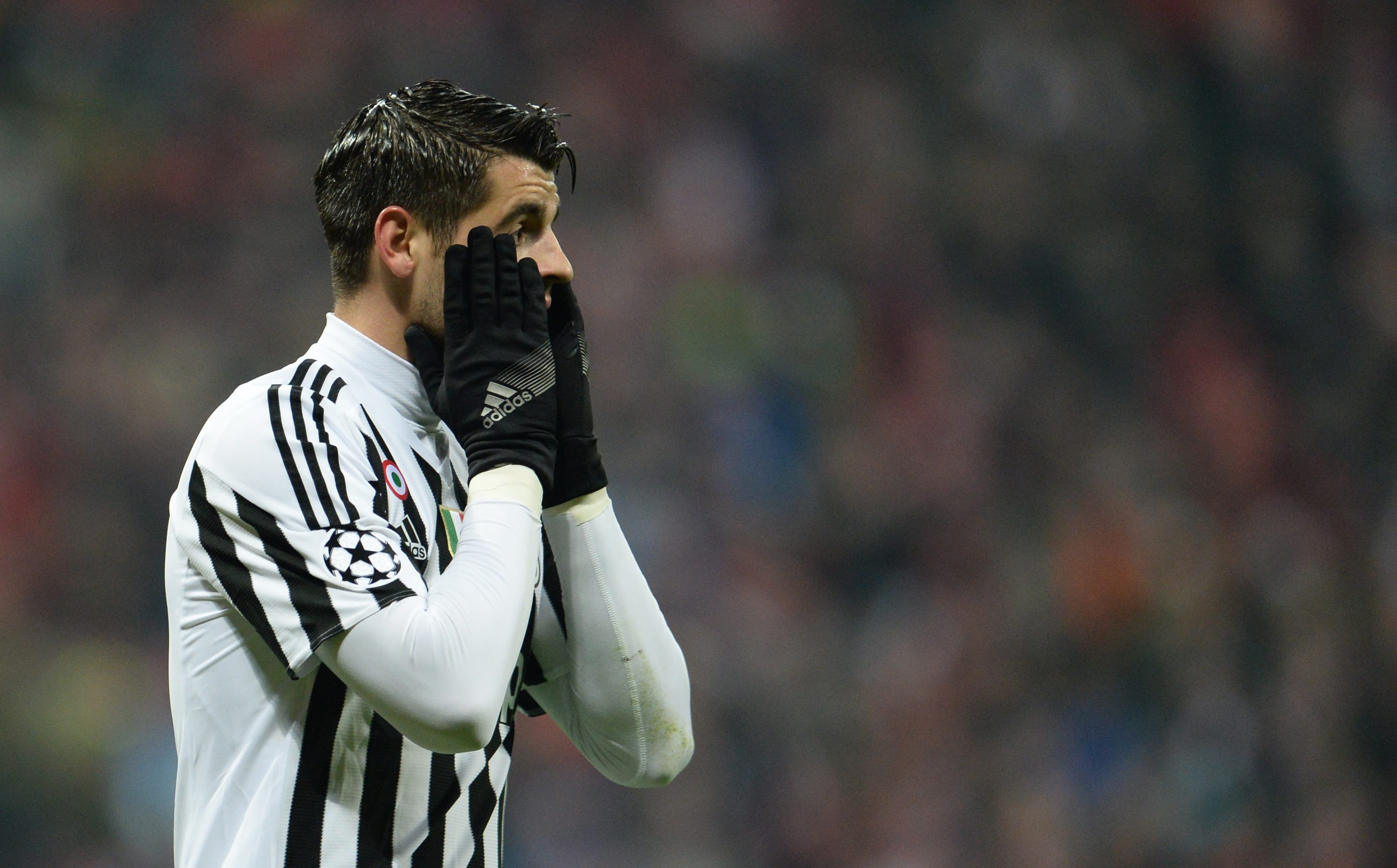 epa05215149 Juventus player Alvaro Morata reacts during the UEFA Champions League Round of 16 second leg match between Bayern Munich and Juventus Turin, in Munich, Germany, 16 March 2016.  EPA/ANDREAS GEBERT