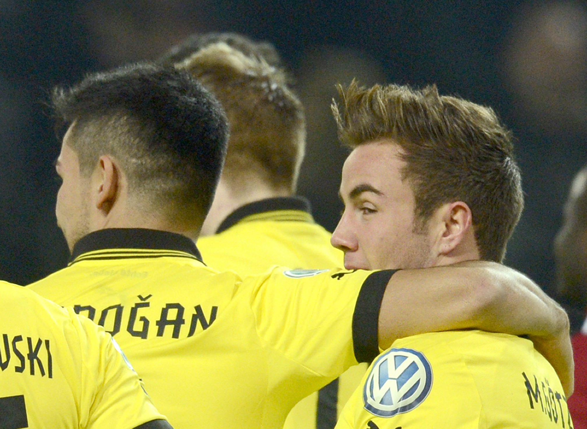 epa03514461 Dortmund's (L-R) Ilkay Gündogan and Mario Goetze celebrate after scoring the opening goal during the round of 16 DFB Cup match between Borussia Dortmund vs Hannover 96 in Dortmund, Germany, 19 December 2012. 
(ATTENTION: The DFB prohibits the utilisation and publication of sequential pictures on the internet and other online media during the match (including half-time). ATTENTION: BLOCKING PERIOD! The DFB permits the further utilisation and publication of the pictures for mobile services (especially MMS) and for DVB-H and DMB only after the end of the match.)  EPA/BERND THISSEN