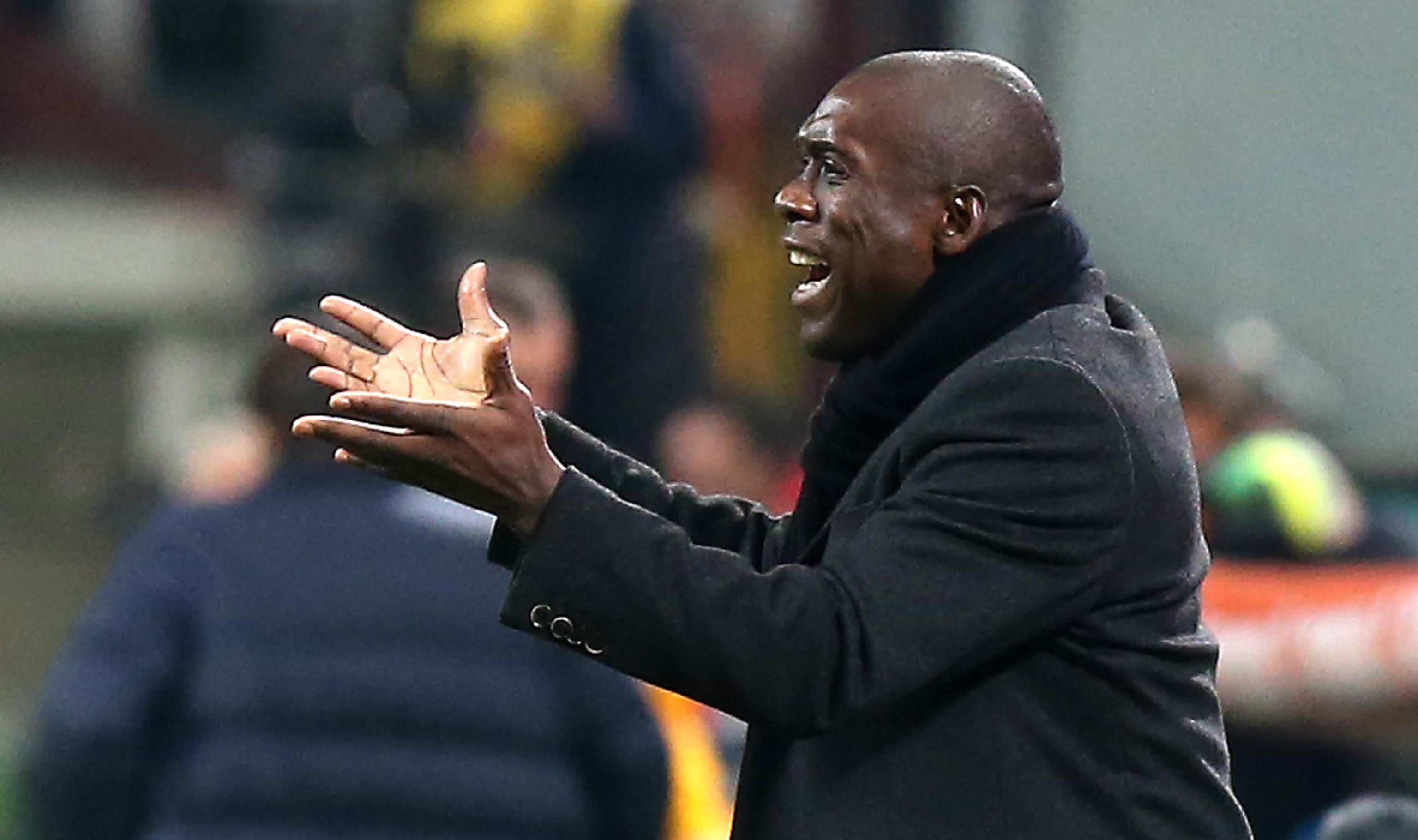 epa04106707 AC Milan head coach Clarence Seedorf gestures the Italian Serie A soccer match beetwen AC Milan and Juventus FC at Giuseppe Meazza Stadium in Milan, Italy, 02 March 2014.  EPA/MATTEO BAZZI