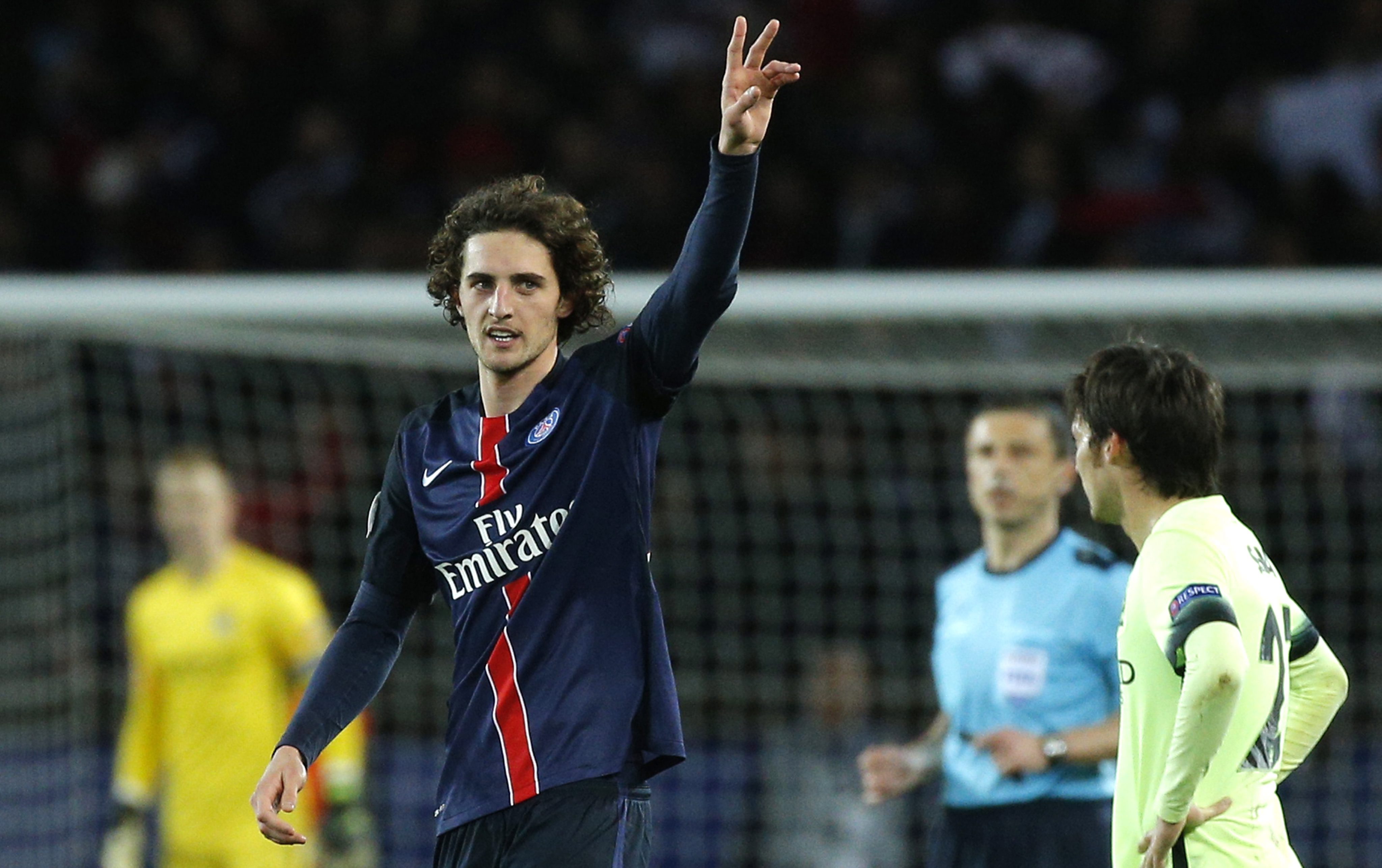 epa05246881 Adrien Rabiot of Paris Saint Germain celebrates scoring a goal during the UEFA Champions League quarter final first leg soccer match between Paris Saint-Germain and Manchester City FC at the Parc des Princes Stadium in Paris, France, 06 April 2016.  EPA/YOAN VALAT