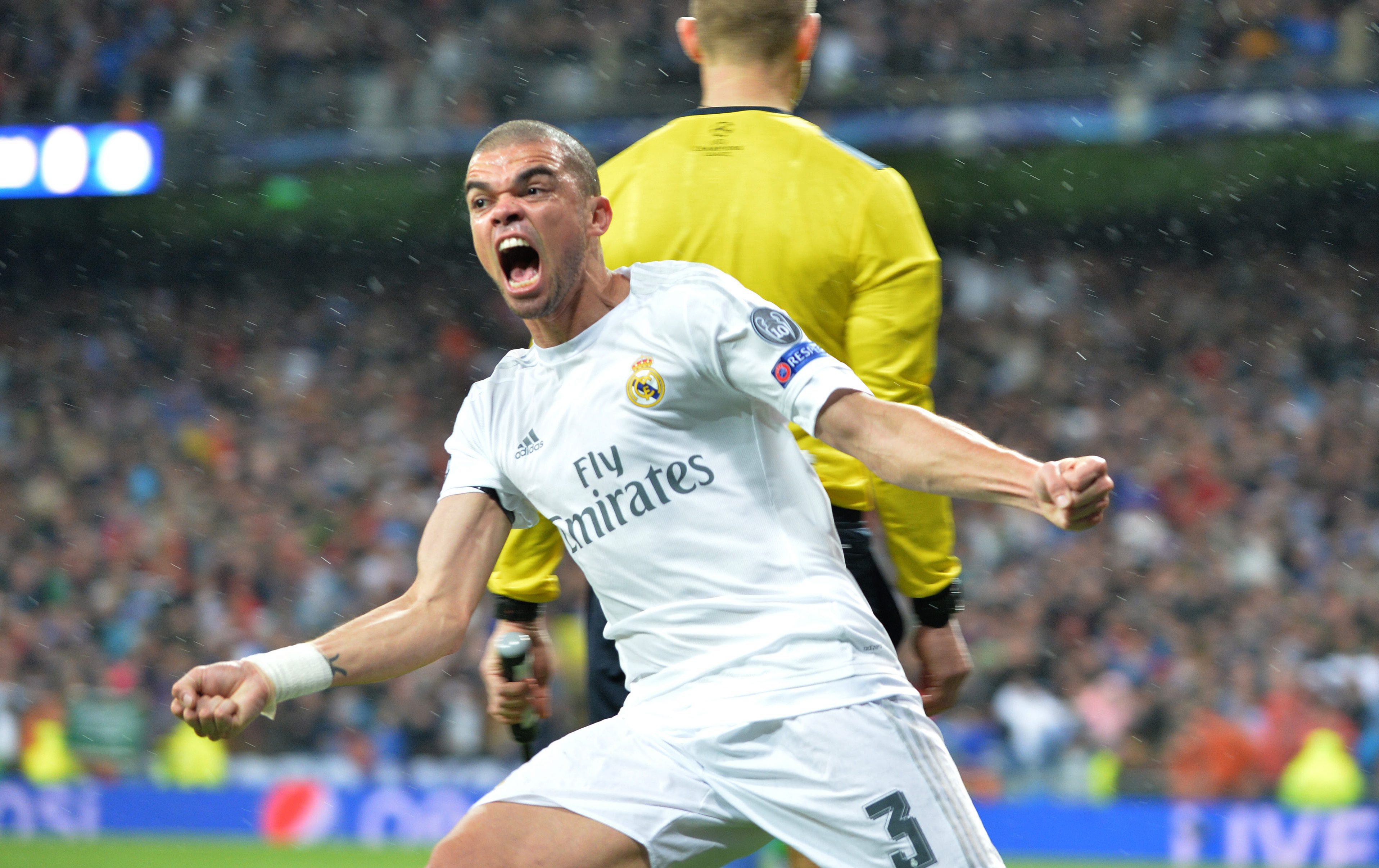 epa05256059 Pepe of Madrid celebrates a goal of his team during the UEFA Champions League quarterfinal second leg soccer match between Real Madrid and VfL Wolfsburg at the Santiago Bernabeu stadium in Madrid, Spain, 12 April, 2016.  EPA/Carmen Jaspersen