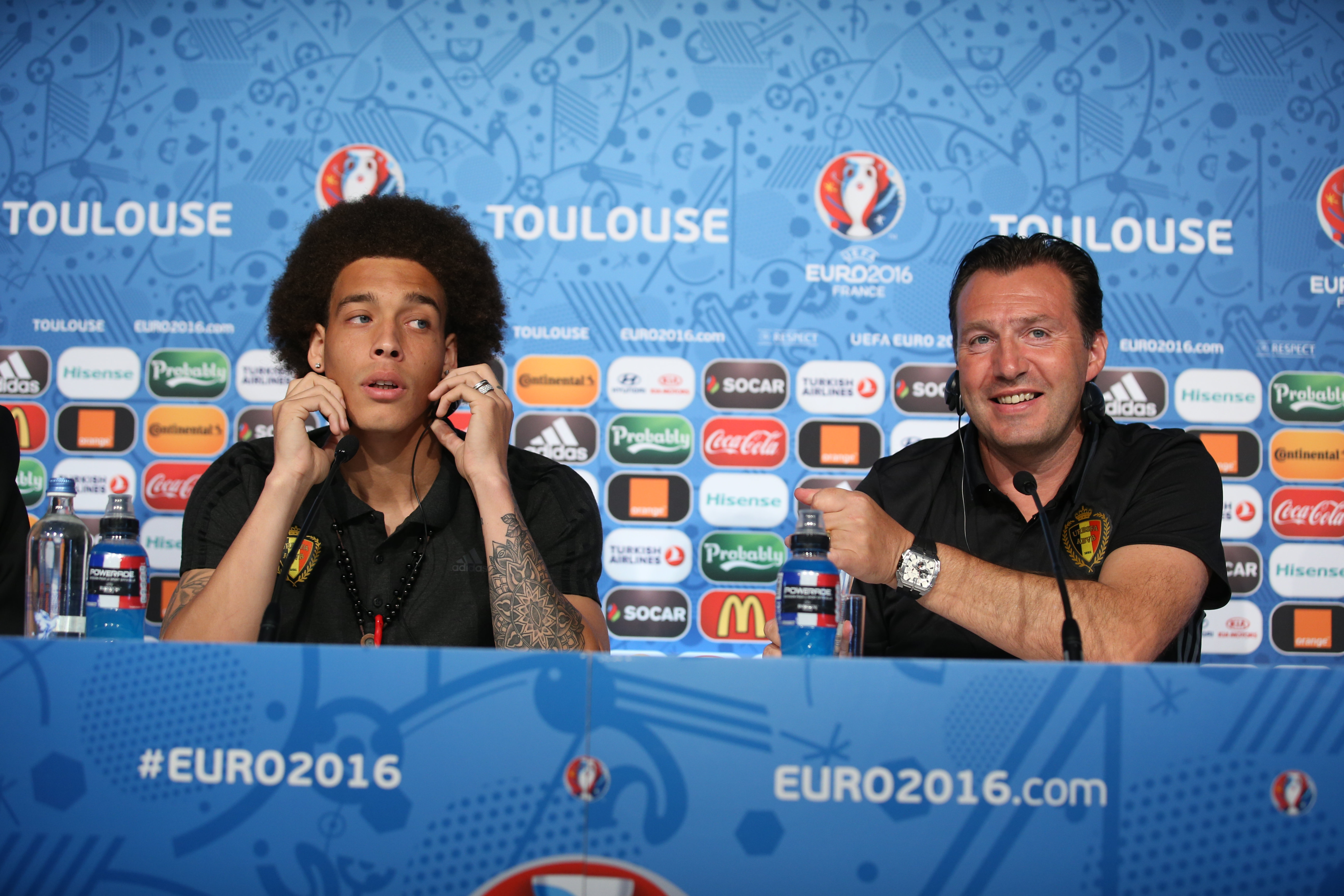 TOULOUSE, FRANCE - JUNE 25:  In this handout image provided by UEFA, Player Axel Witsel and Head coach Marc Wilmots of Belgium attend the press conference at Stadium Municipal on June 25, 2016 in Toulouse, France. (Photo by Handout/Getty Images)