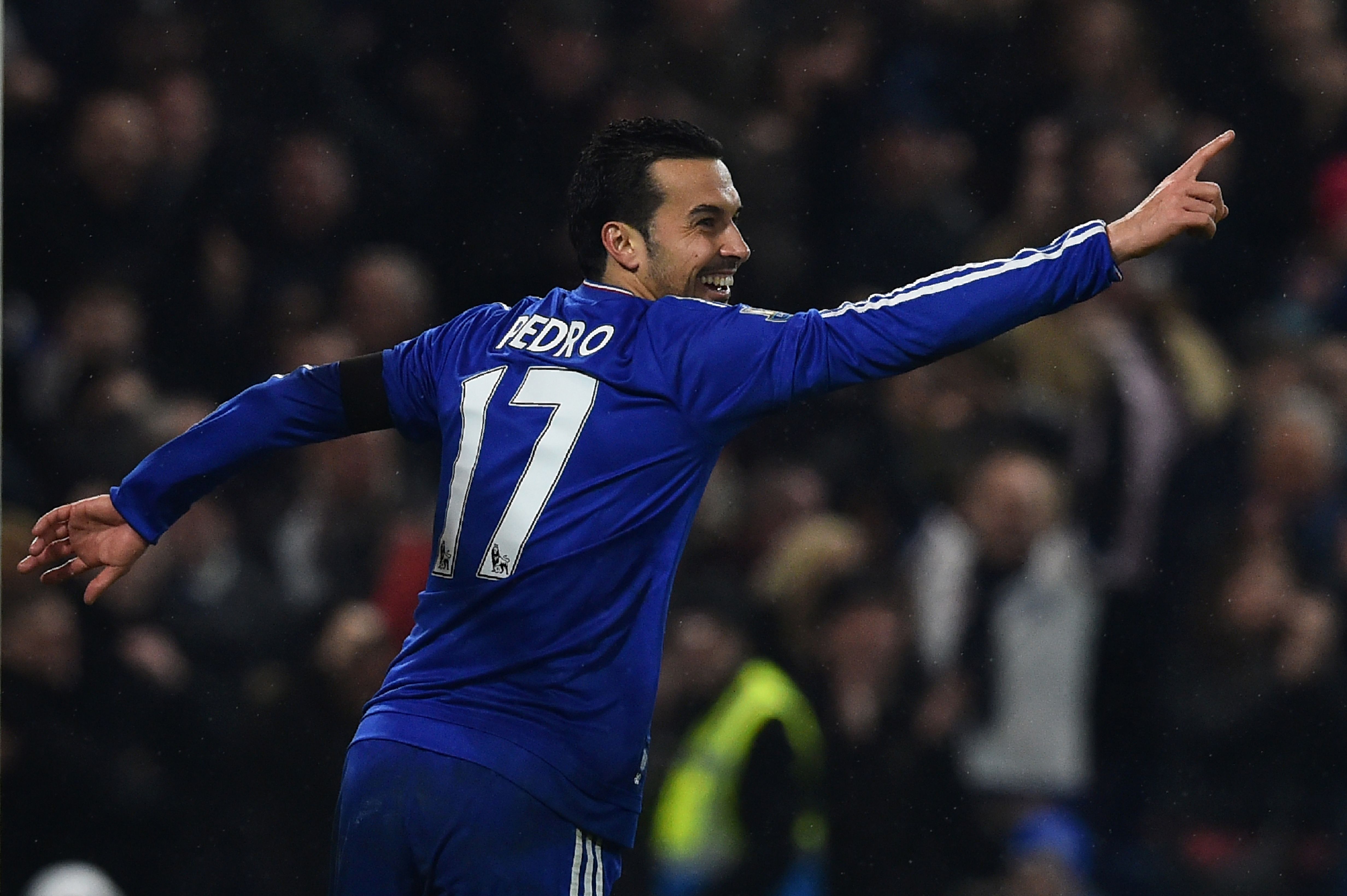 Chelsea's Spanish midfielder Pedro celebrates scoring his second and their fourth goal during the English Premier League football match between Chelsea and Newcastle United at Stamford Bridge in London on February 13, 2016.  / AFP / BEN STANSALL        (Photo credit should read BEN STANSALL/AFP/Getty Images)