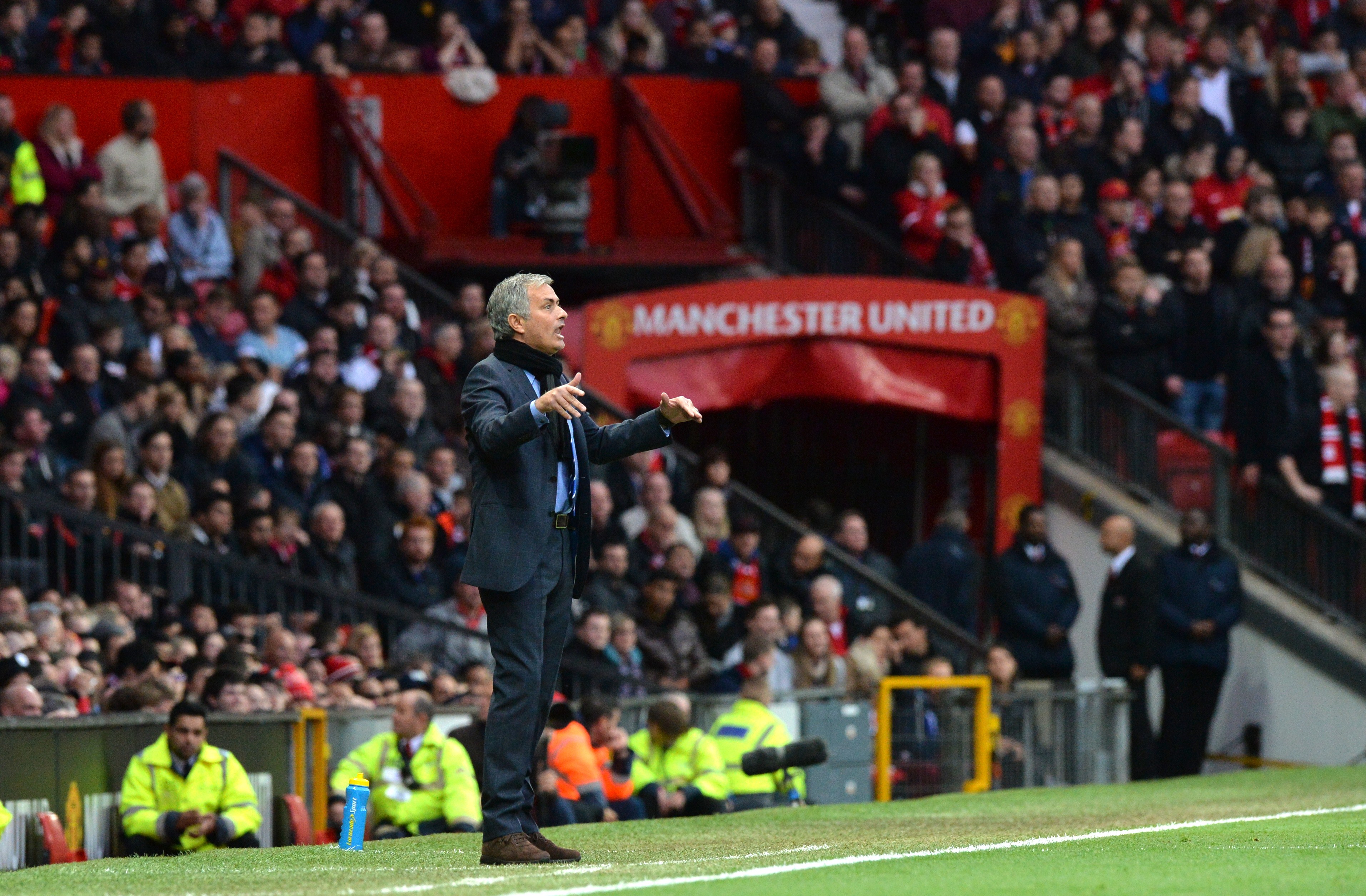 Chelsea's Portuguese manager Jose Mourinho gestures during the English Premier League football match between Manchester United and Chelsea at Old Trafford in Manchester, north west England, on October 26, 2014.  AFP PHOTO / PAUL ELLIS 

RESTRICTED TO EDITORIAL USE. No use with unauthorized audio, video, data, fixture lists, club/league logos or live services. Online in-match use limited to 45 images, no video emulation. No use in betting, games or single club/league/player publications.        (Photo credit should read PAUL ELLIS/AFP/Getty Images)