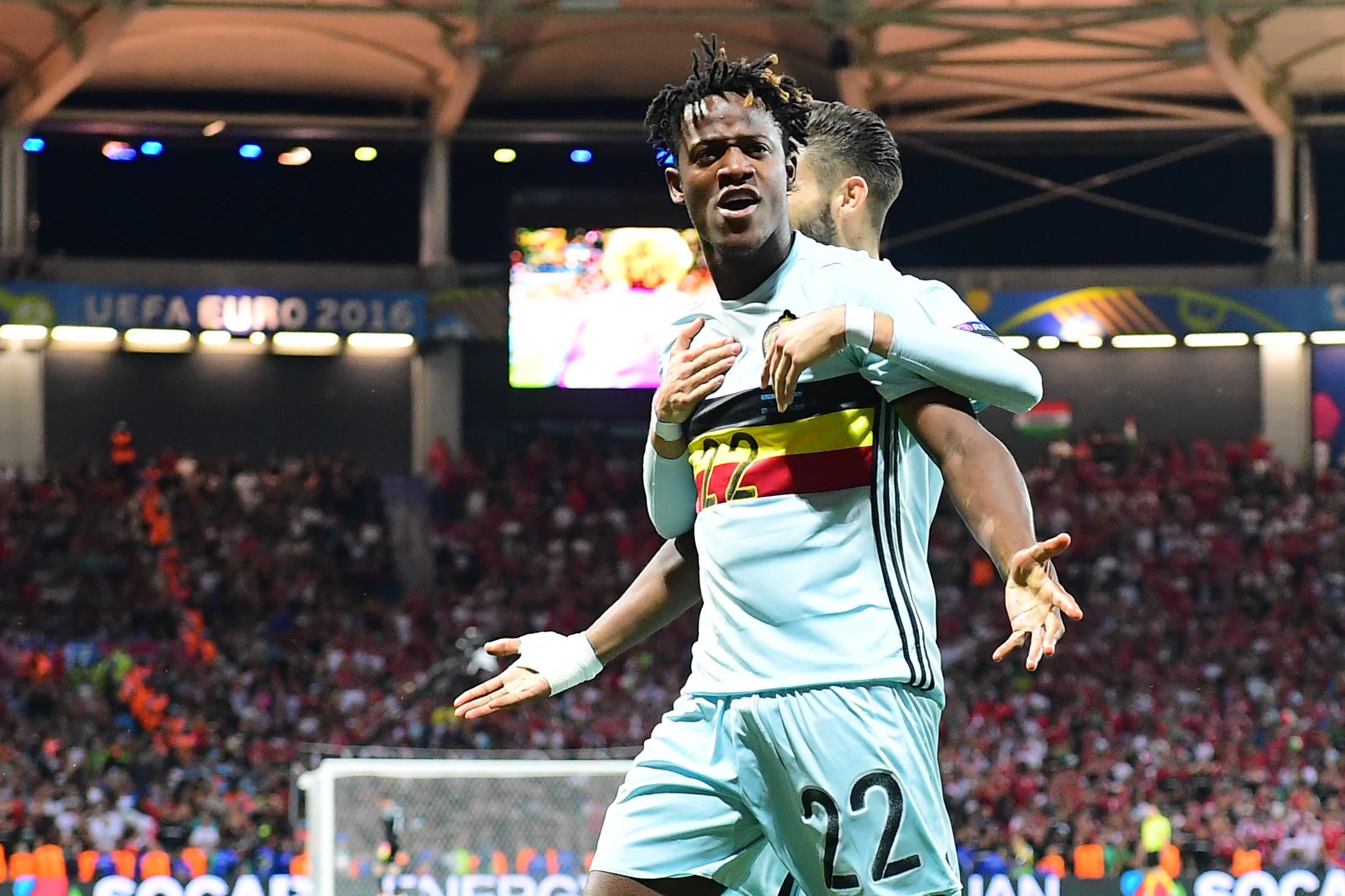 Belgium's forward Michy Batshuayi (L) celebrates after scoring his team's second goal  during the Euro 2016 round of 16 football match between Hungary and Belgium at the Stadium Municipal in Toulouse on June 26, 2016.   / AFP / EMMANUEL DUNAND        (Photo credit should read EMMANUEL DUNAND/AFP/Getty Images)