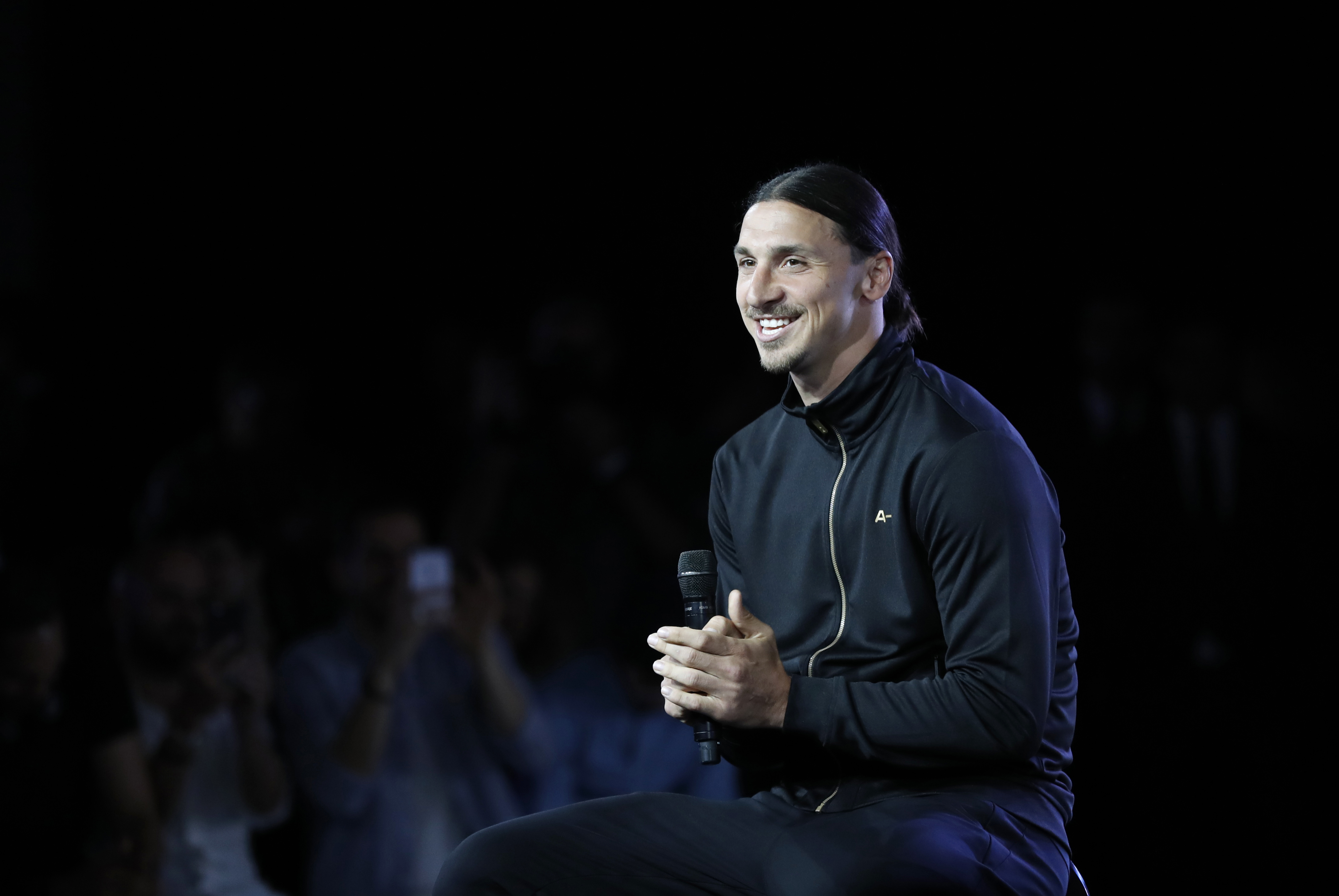 Former Paris Saint-Germain (PSG) forward Zlatan Ibrahimovic smiles during a press conference for the presentation of his sportswear brand A-Z, on June 7, 2016 in Paris.  / AFP / FRANCOIS GUILLOT        (Photo credit should read FRANCOIS GUILLOT/AFP/Getty Images)