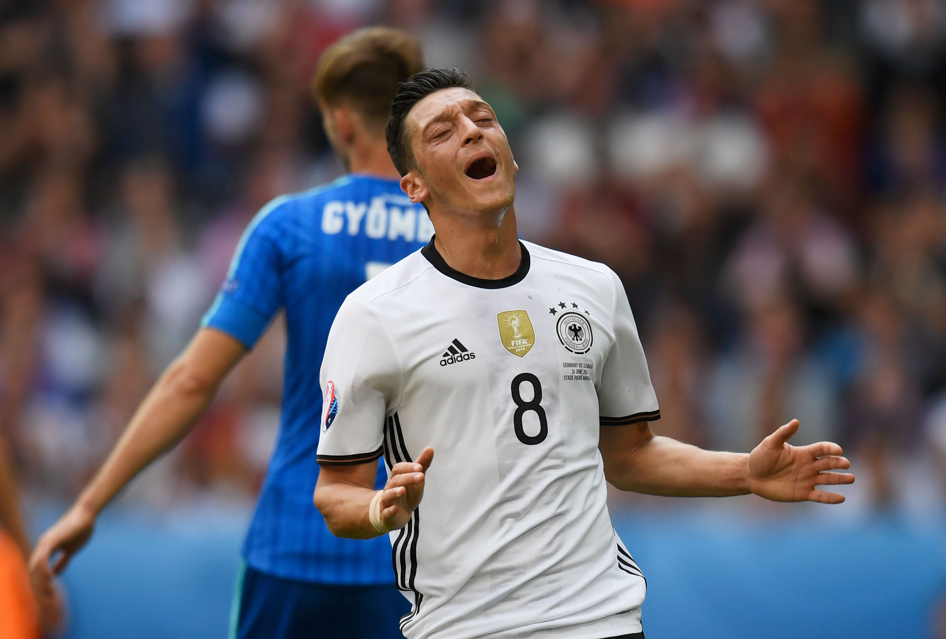 LILLE, FRANCE - JUNE 26:  Mesut Oezil of Germany reacts after missing a chance during the UEFA EURO 2016 round of 16 match between Germany and Slovakia at Stade Pierre-Mauroy on June 26, 2016 in Lille, France.  (Photo by Mike Hewitt/Getty Images)