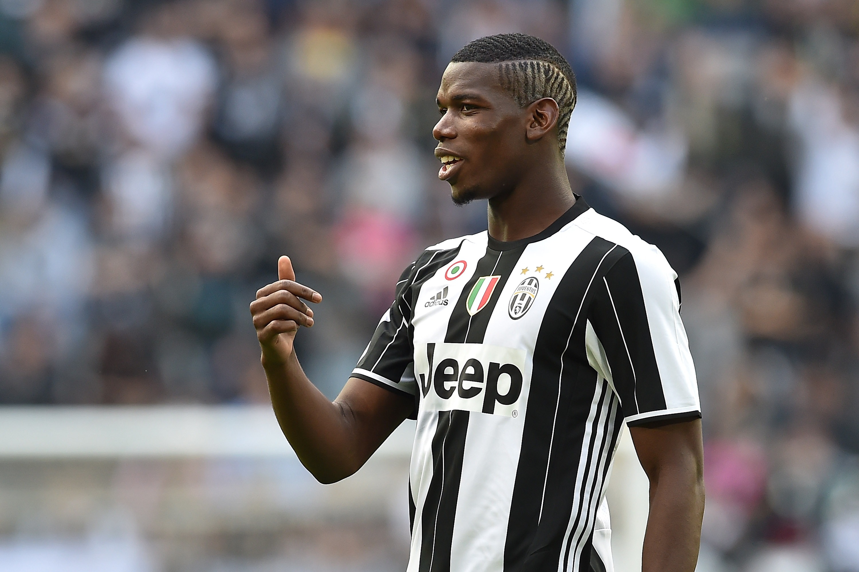 TURIN, ITALY - MAY 14:  Paul Pogba of Juventus FC looks on during the Serie A match between Juventus FC and UC Sampdoria at Juventus Arena on May 14, 2016 in Turin, Italy.  (Photo by Valerio Pennicino/Getty Images)