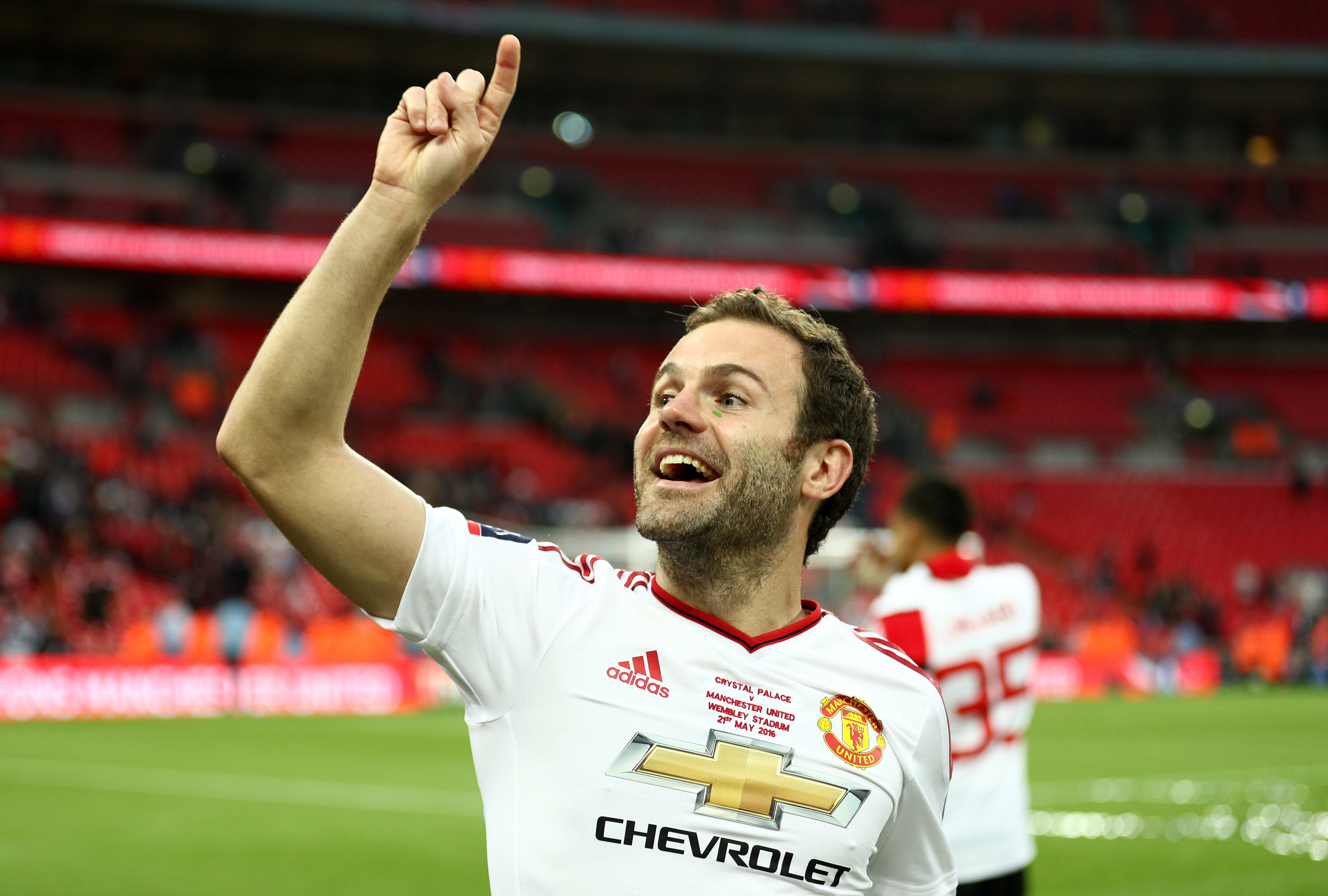 LONDON, ENGLAND - MAY 21:  Juan Mata of Manchester United celebrates victory on the pitch after The Emirates FA Cup Final match between Manchester United and Crystal Palace at Wembley Stadium on May 21, 2016 in London, England.  (Photo by Paul Gilham/Getty Images)