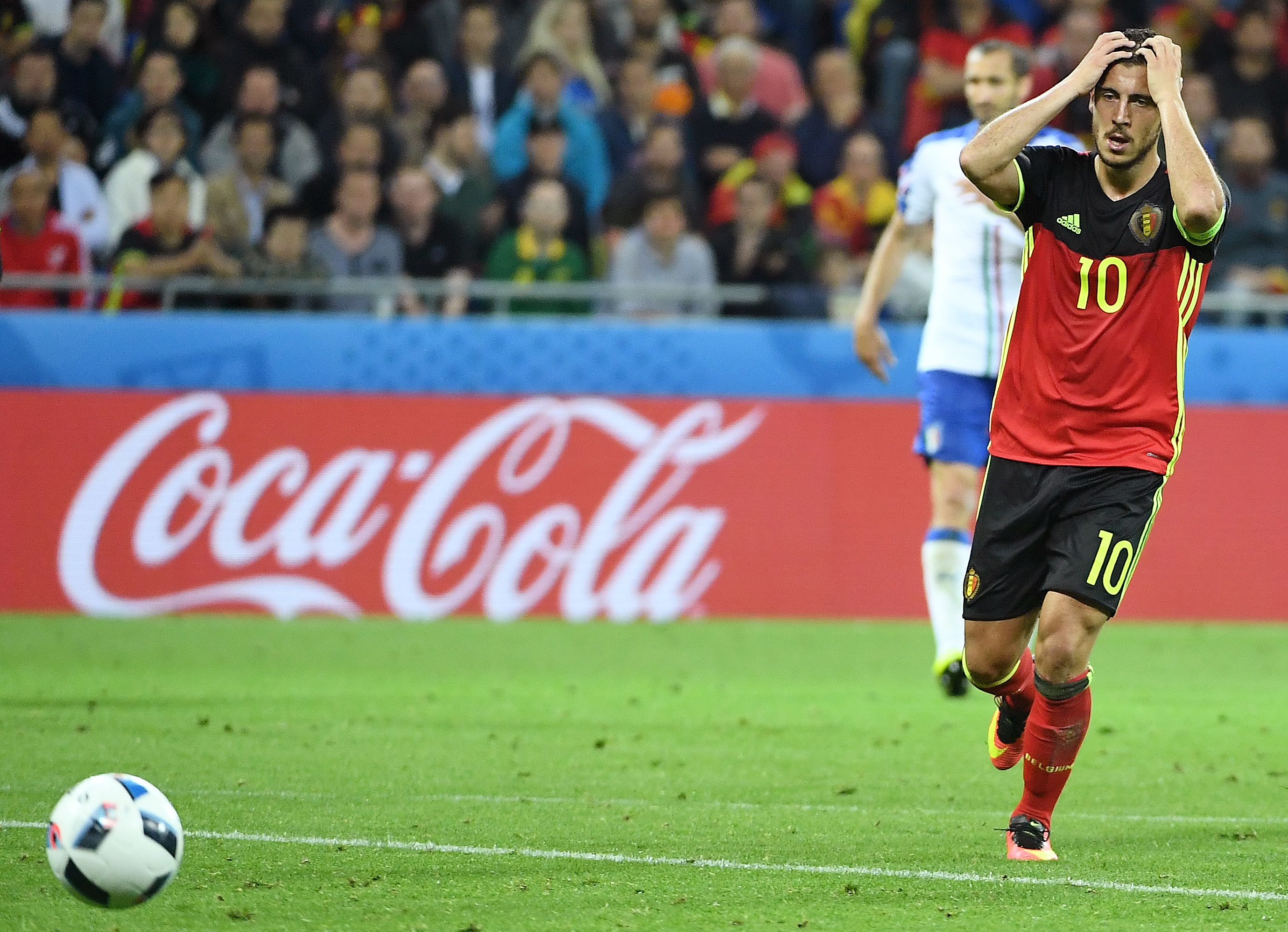 TOPSHOT - Belgium's forward Eden Hazard reacts during the Euro 2016 group E football match between Belgium and Italy at the Parc Olympique Lyonnais stadium in Lyon on June 13, 2016. Italy won 2-0.  / AFP / EMMANUEL DUNAND        (Photo credit should read EMMANUEL DUNAND/AFP/Getty Images)