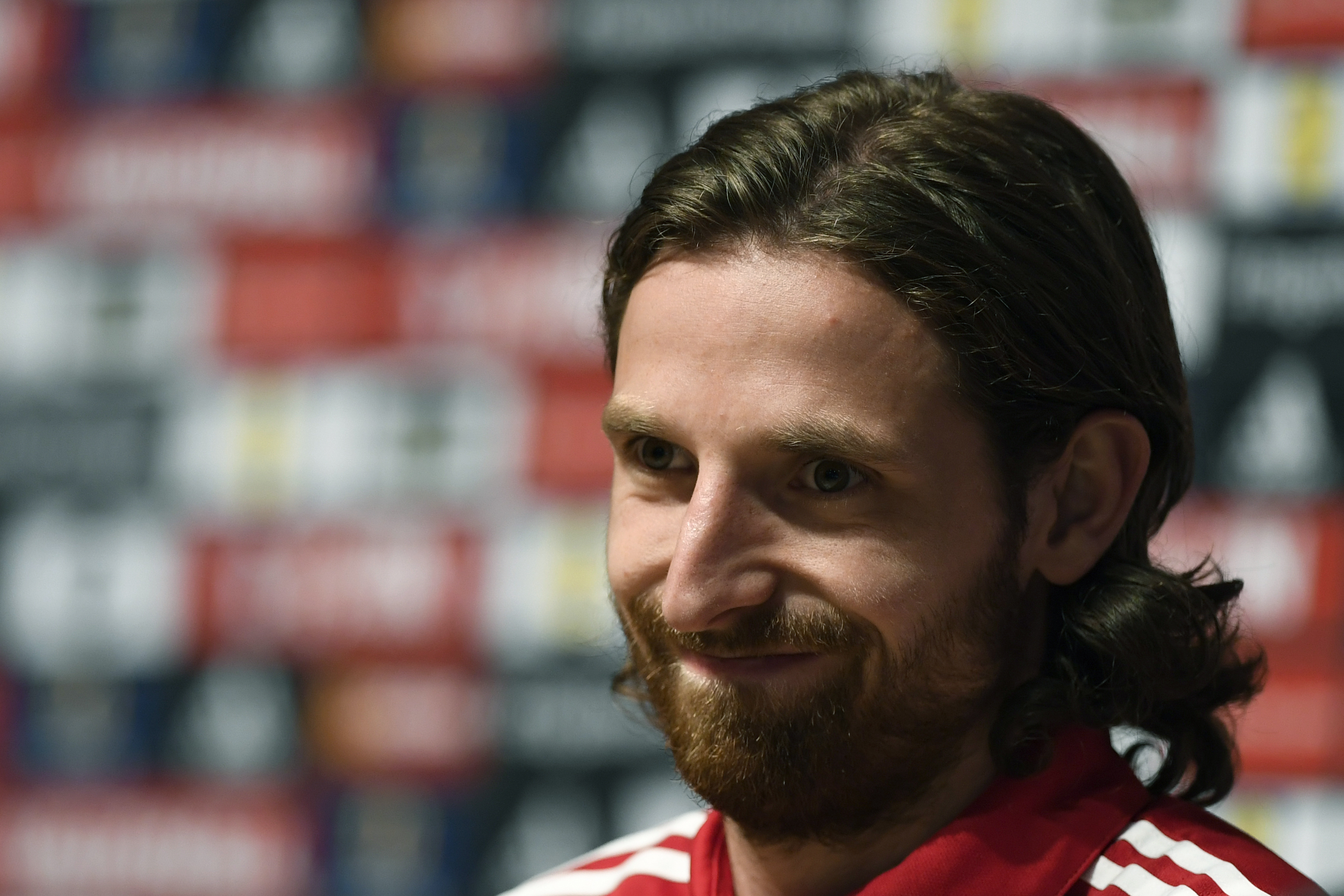 Wales' midfielder Joe Allen attends a press conference in Dinard, Western France, on June 18, 2016, during the Euro 2016 football tournament.   / AFP / DAMIEN MEYER        (Photo credit should read DAMIEN MEYER/AFP/Getty Images)