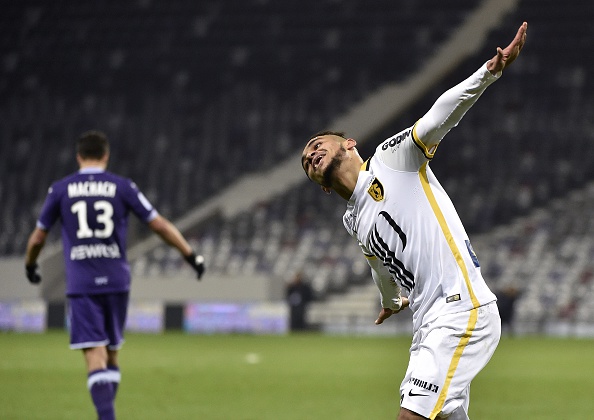 Lille's French midfielder Sofiane Boufal celebrates after scoring a goal  during the French L1 football match between Toulouse (TFC) and Lille (LOSC) on December 19, 2015 at the Municipal Stadium in Toulouse, southern france. AFP PHOTO / PASCAL PAVANI / AFP / PASCAL PAVANI        (Photo credit should read PASCAL PAVANI/AFP/Getty Images)
