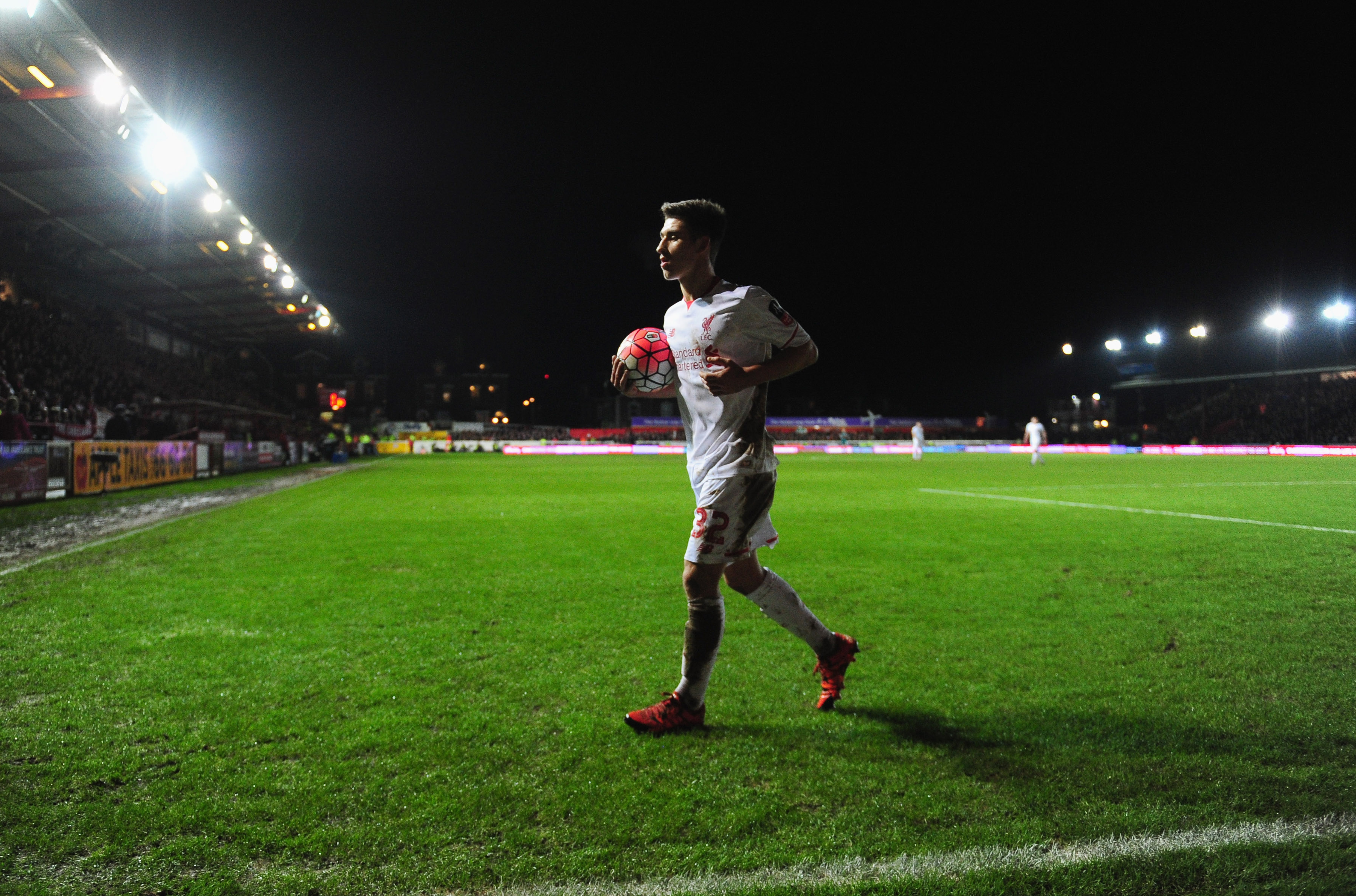 EXETER, ENGLAND - JANUARY 08:  Cameron Brannagan of Liverpool prepares to take a corner during the Emirates FA Cup third round match between Exeter City and Liverpool at St James Park on January 8, 2016 in Exeter, England.  (Photo by Dan Mullan/Getty Images)