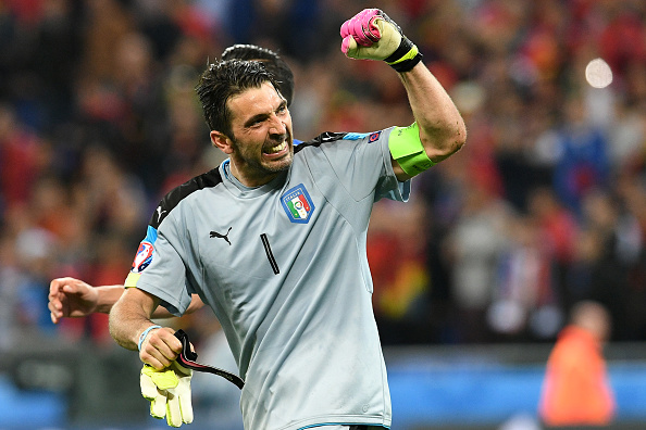 Italy's goalkeeper Gianluigi Buffon celebrate after winning the Euro 2016 group E football match against Belgium at the Parc Olympique Lyonnais stadium in Lyon on June 13, 2016. / AFP / VINCENZO PINTO        (Photo credit should read VINCENZO PINTO/AFP/Getty Images)