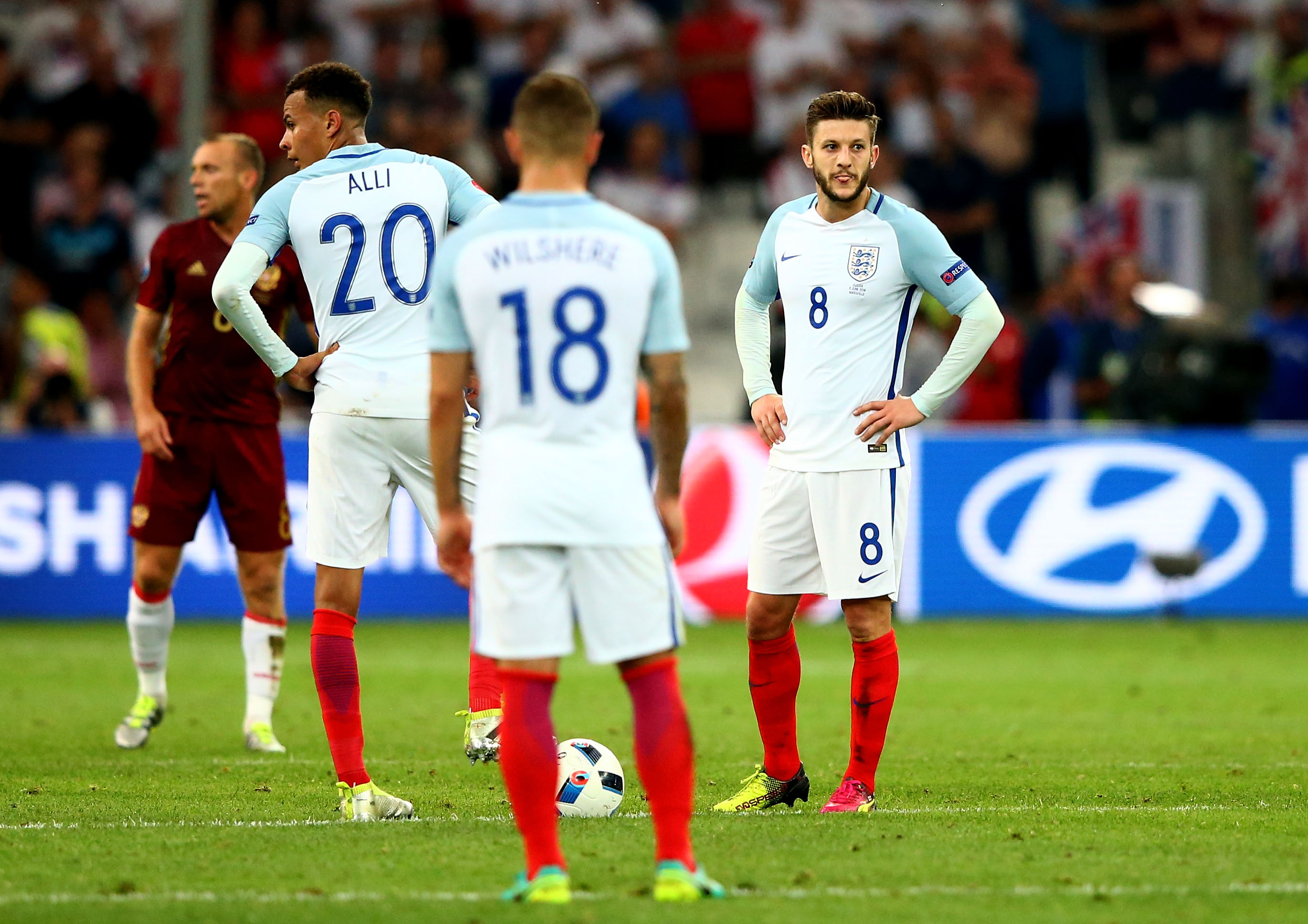 MARSEILLE, FRANCE - JUNE 11: Dele Alli (L) and Adam Lallana (R) of England show their frustrations after Russia's first goal during the UEFA EURO 2016 Group B match between England and Russia at Stade Velodrome on June 11, 2016 in Marseille, France.  (Photo by Alex Livesey/Getty Images)