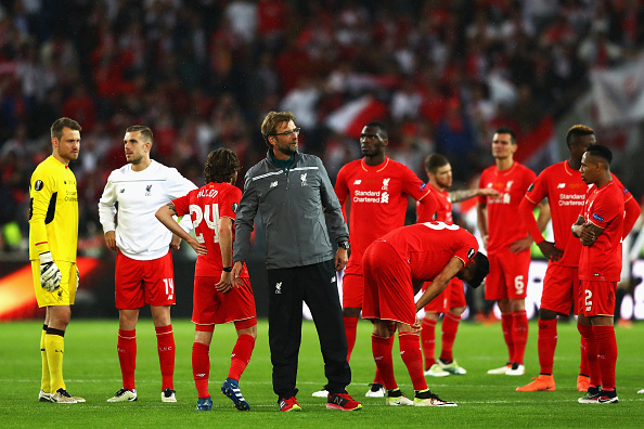 BASEL, SWITZERLAND - MAY 18:  Jurgen Klopp, manager of Liverpool and players look on at the award ceremoy after the UEFA Europa League Final match between Liverpool and Sevilla at St. Jakob-Park on May 18, 2016 in Basel, Switzerland.  (Photo by Michael Steele/Getty Images)