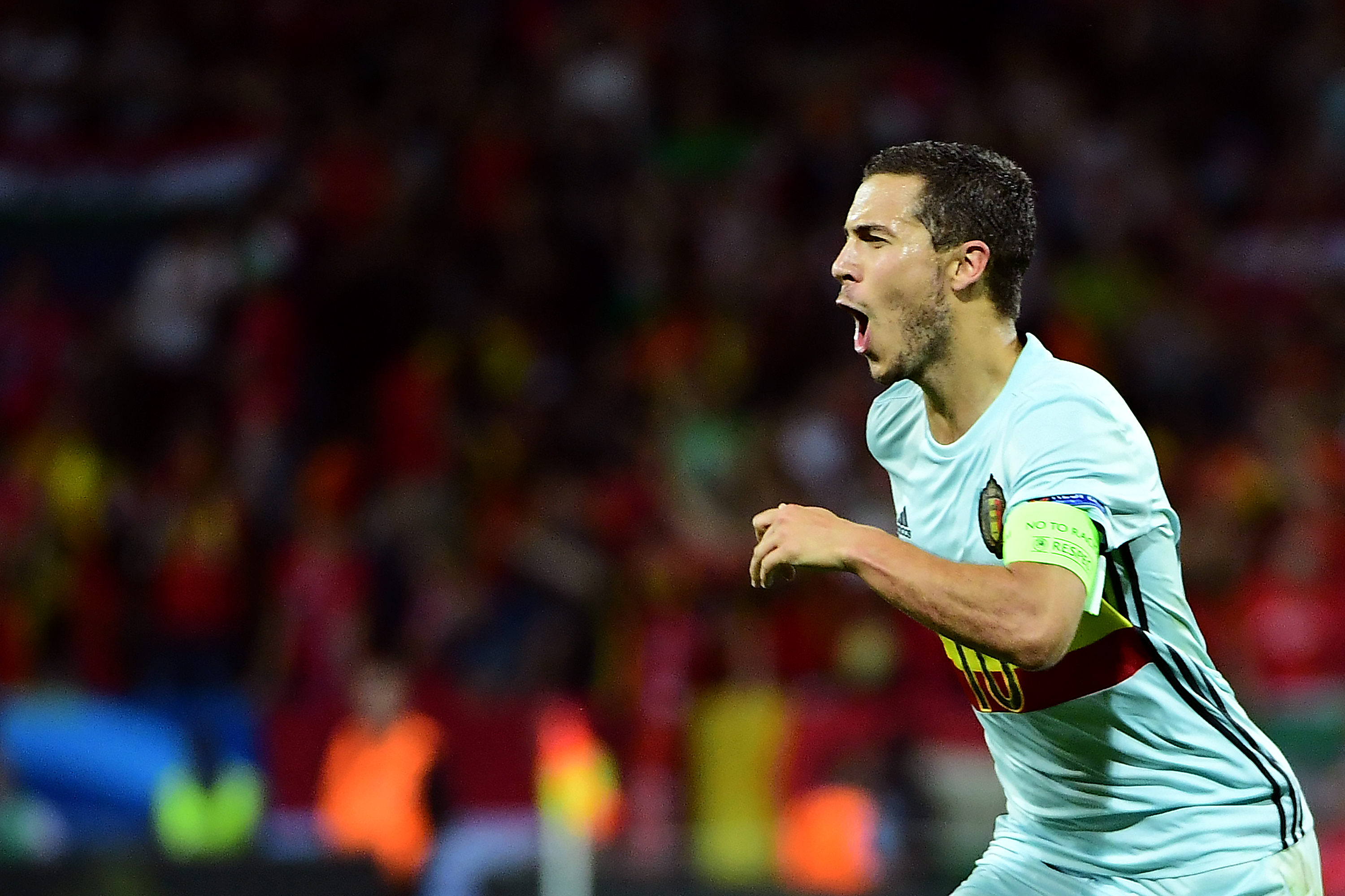 Belgium's forward Eden Hazard celebrates after scoring his team's third goal  during the Euro 2016 round of 16 football match between Hungary and Belgium at the Stadium Municipal in Toulouse on June 26, 2016.   / AFP / EMMANUEL DUNAND        (Photo credit should read EMMANUEL DUNAND/AFP/Getty Images)