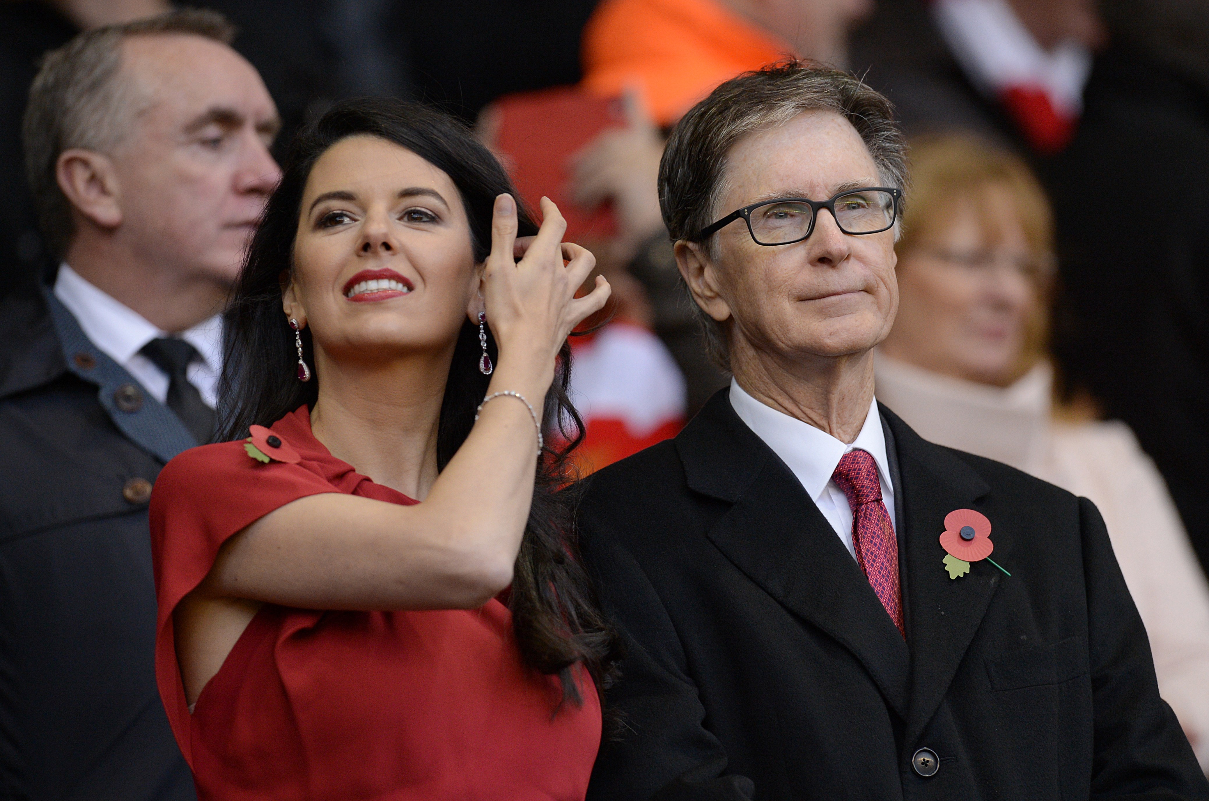 Liverpool's US owner John W. Henry (R) and his wife Linda Pizzuti in the crowd during the English Premier League football match between Liverpool and Southampton at Anfield stadium in Liverpool, north west England on October 25, 2015. The game finished 1-1. AFP PHOTO / OLI SCARFF

RESTRICTED TO EDITORIAL USE. No use with unauthorized audio, video, data, fixture lists, club/league logos or 'live' services. Online in-match use limited to 75 images, no video emulation. No use in betting, games or single club/league/player publications.        (Photo credit should read OLI SCARFF,OLI SCARFF/AFP/Getty Images)