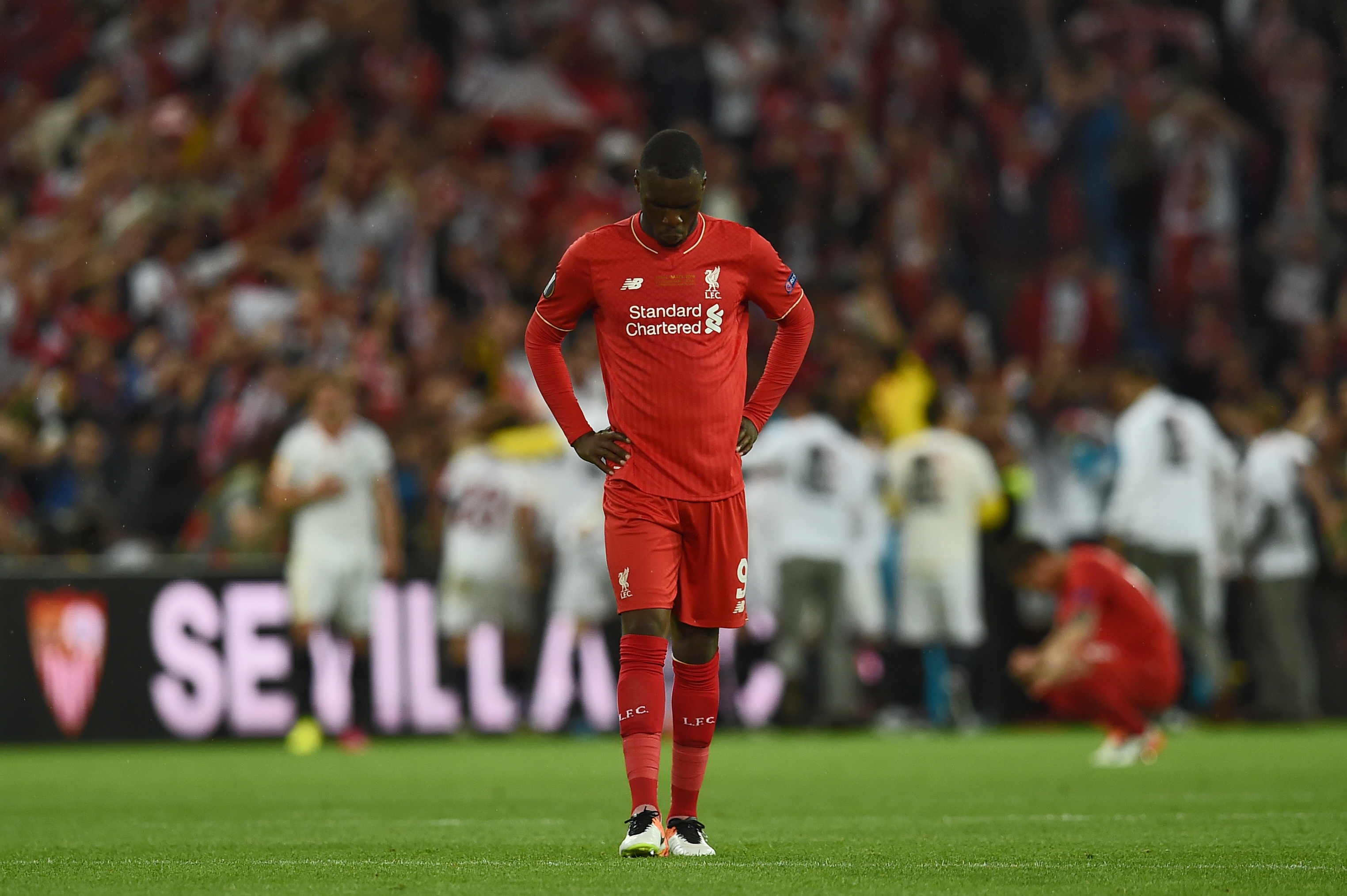 Liverpool's Belgian forward Christian Benteke reacts  after losing  the UEFA Europa League final football match between Liverpool FC and Sevilla FC at the St Jakob-Park stadium in Basel, on May 18, 2016.   AFP PHOTO / PAUL ELLIS / AFP / PAUL ELLIS        (Photo credit should read PAUL ELLIS/AFP/Getty Images)