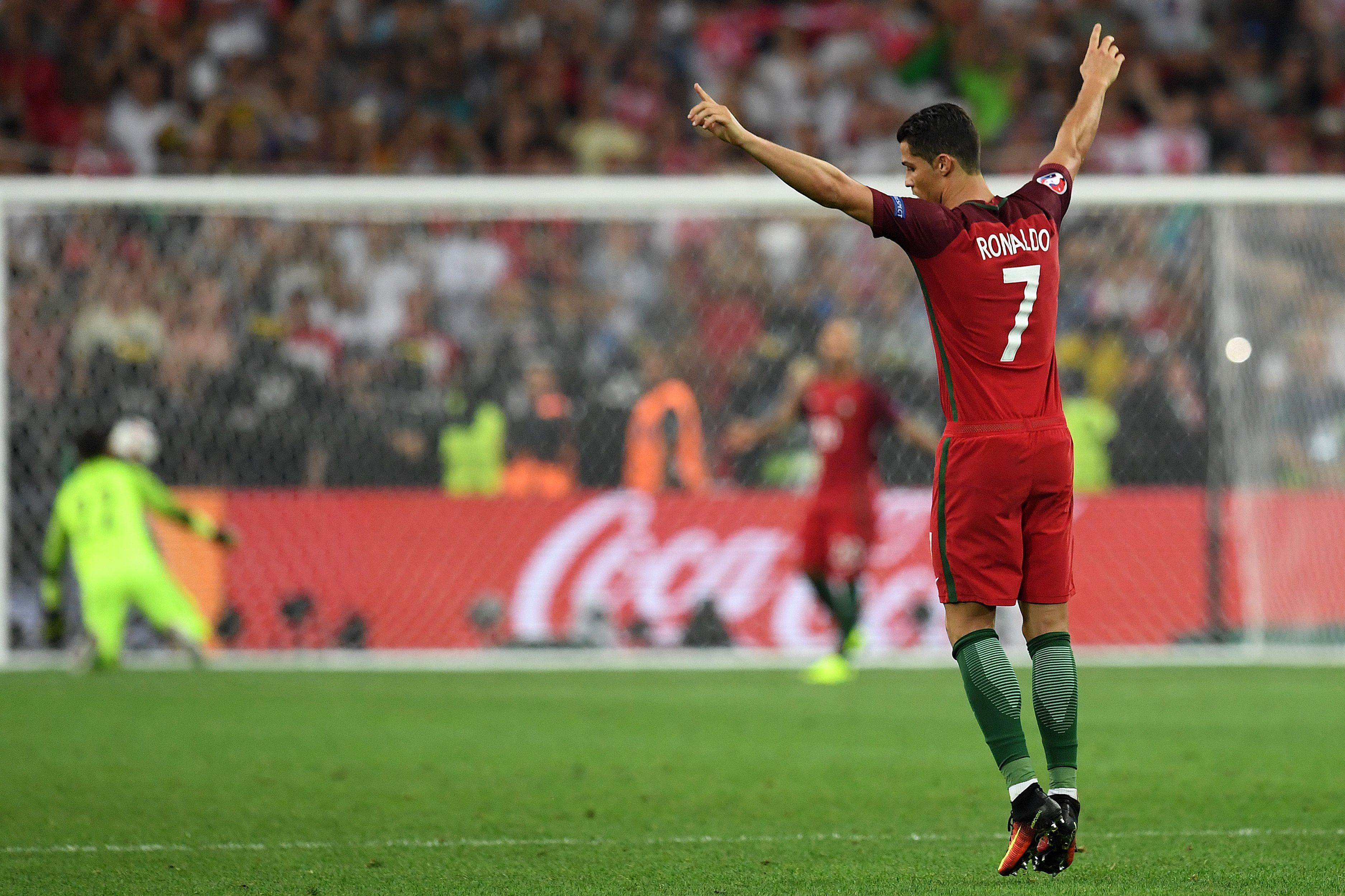 Portugal's forward Cristiano Ronaldo celebrates after Portugal's forward Ricardo Quaresma scored the winning goal in a penalty shoot-out during the Euro 2016 quarter-final football match between Poland and Portugal at the Stade Velodrome in Marseille on June 30, 2016. / AFP / FRANCISCO LEONG        (Photo credit should read FRANCISCO LEONG/AFP/Getty Images)