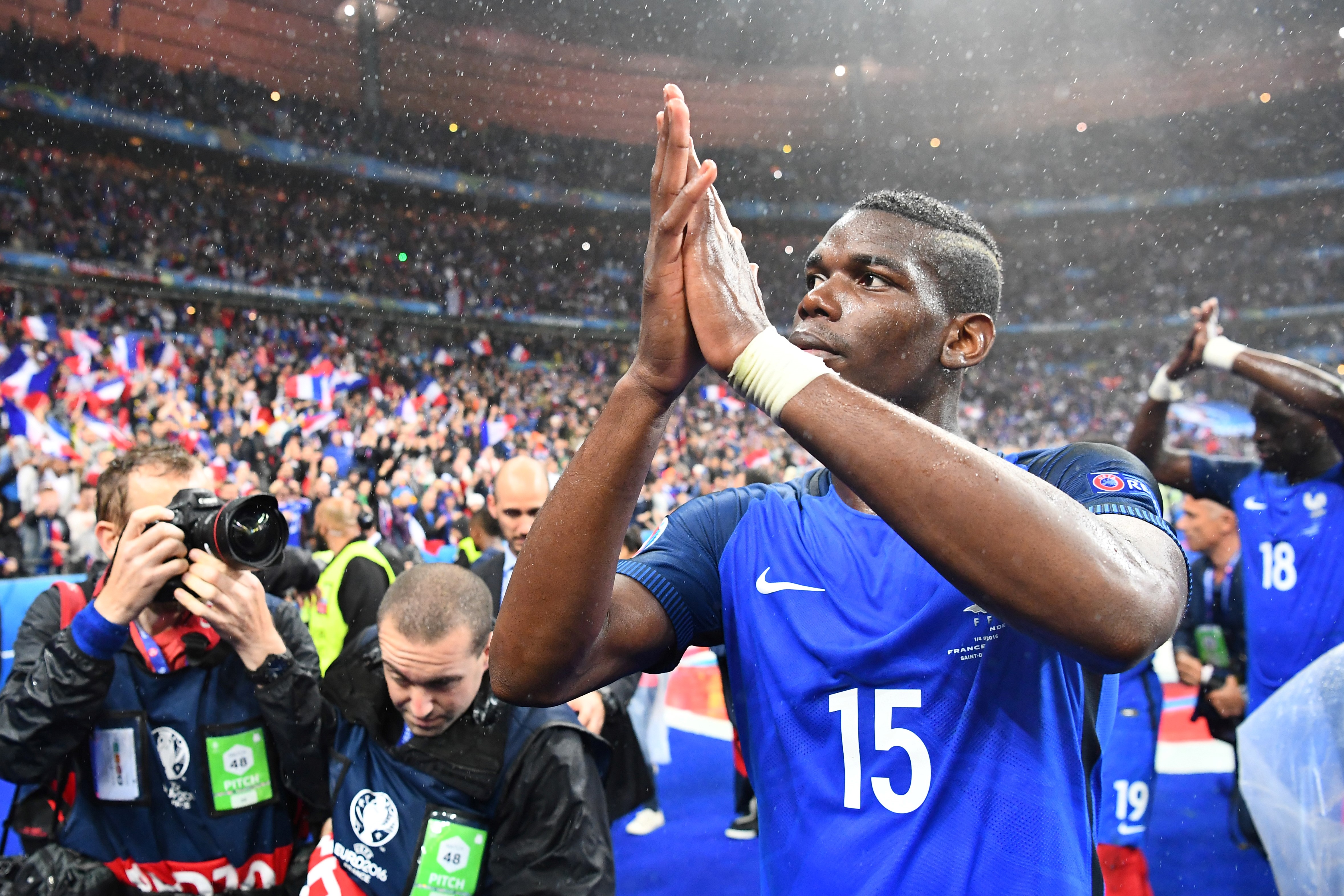 France's midfielder Paul Pogba, who scored the second goal for France, acknowledges the crowds after beating Iceland 5-2 in the Euro 2016 quarter-final football match between France and Iceland at the Stade de France in Saint-Denis, near Paris, on July 3, 2016.
 / AFP / FRANCK FIFE        (Photo credit should read FRANCK FIFE/AFP/Getty Images)