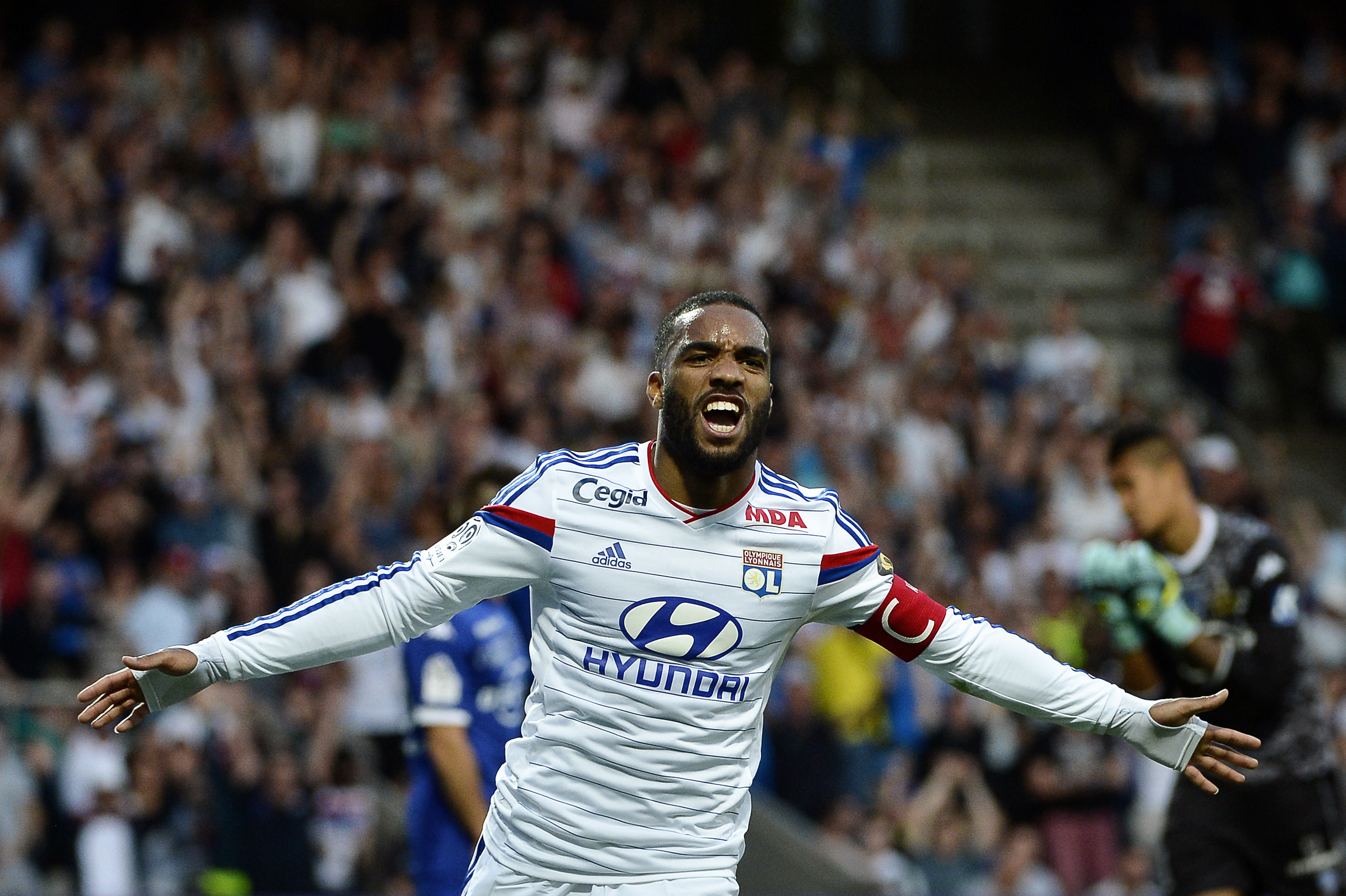 Alexandre Lacazette has established himself as one of the best forwards in Europe right now and reportedly wants to leave Lyon to take the next step in his fledgling career.(Picture Courtesy - AFP/Getty Images)
